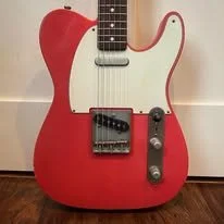 Orange Relic’d “T” Style