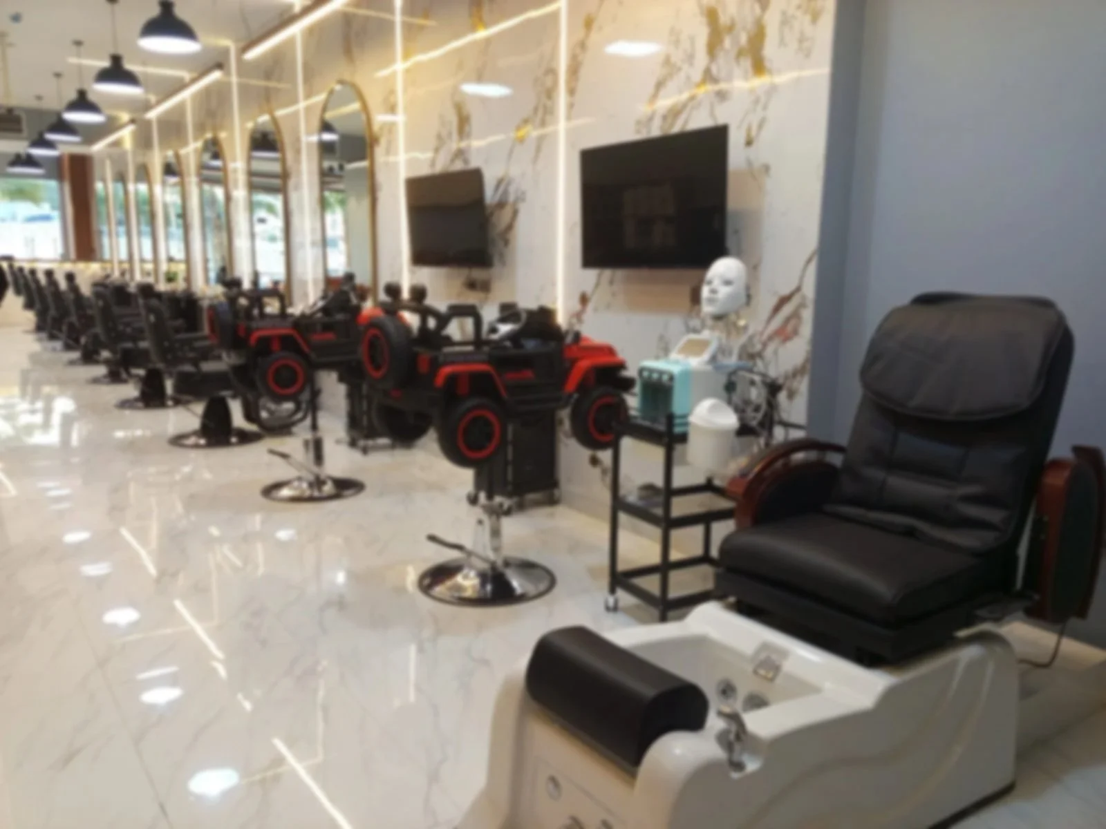 A row of salon chairs with hair styling equipment, including a facial steamer, in a modern, well-lit salon with a marble floor and wall mirrors.