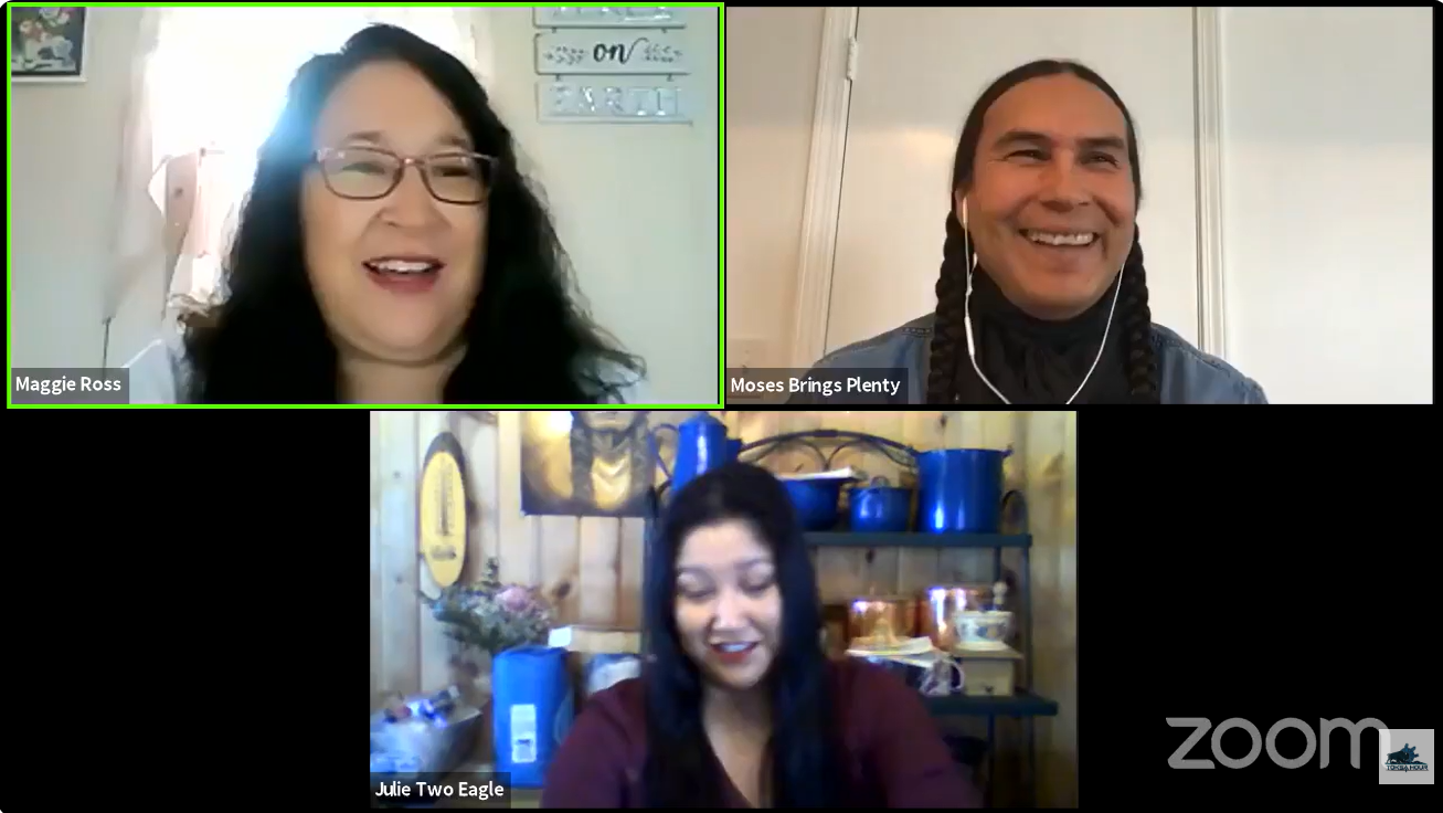 Three women on a virtual video call, with two in the top row and one in the bottom row, smiling and talking.