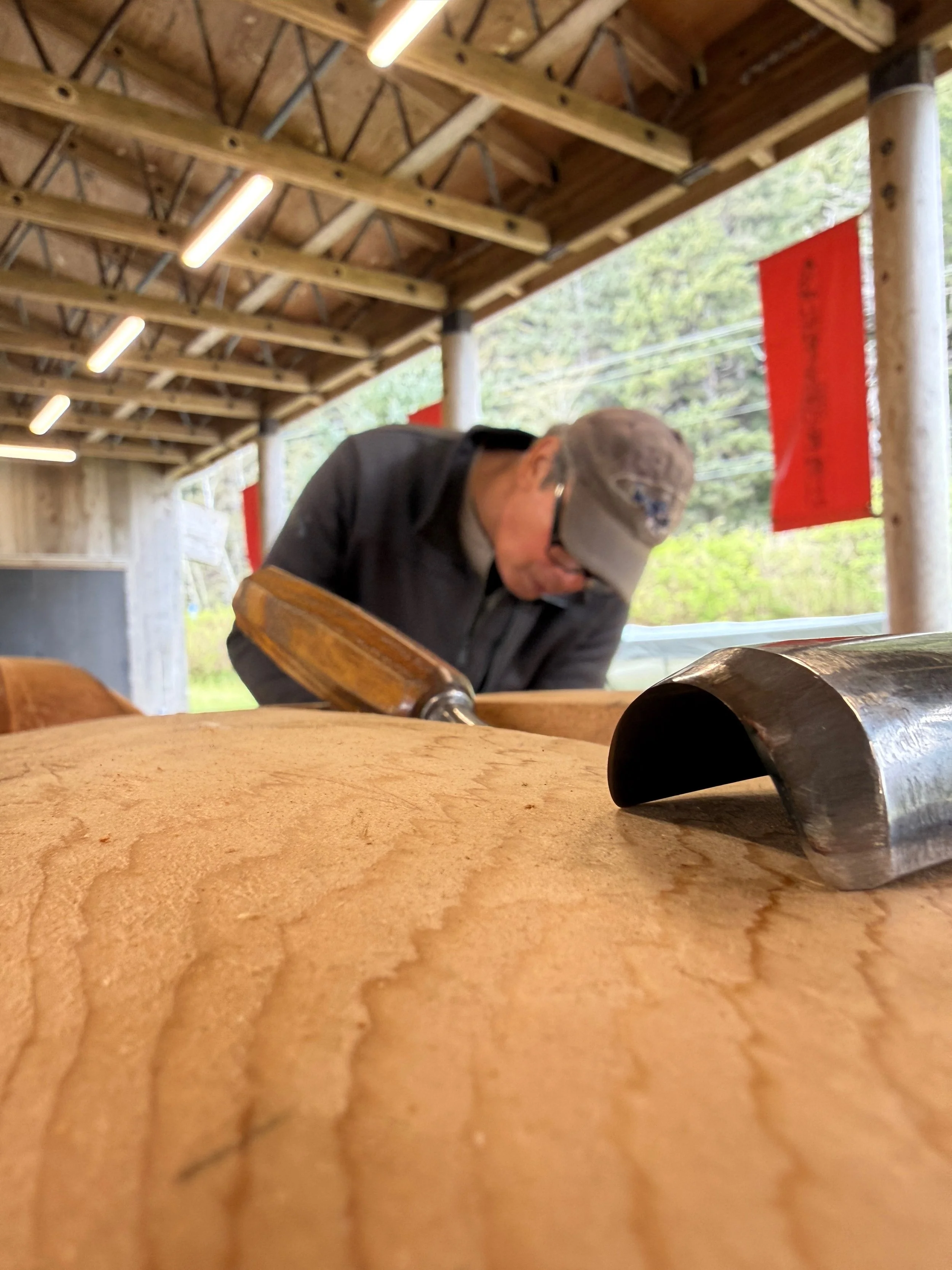 Totem carver at Haida Museum.