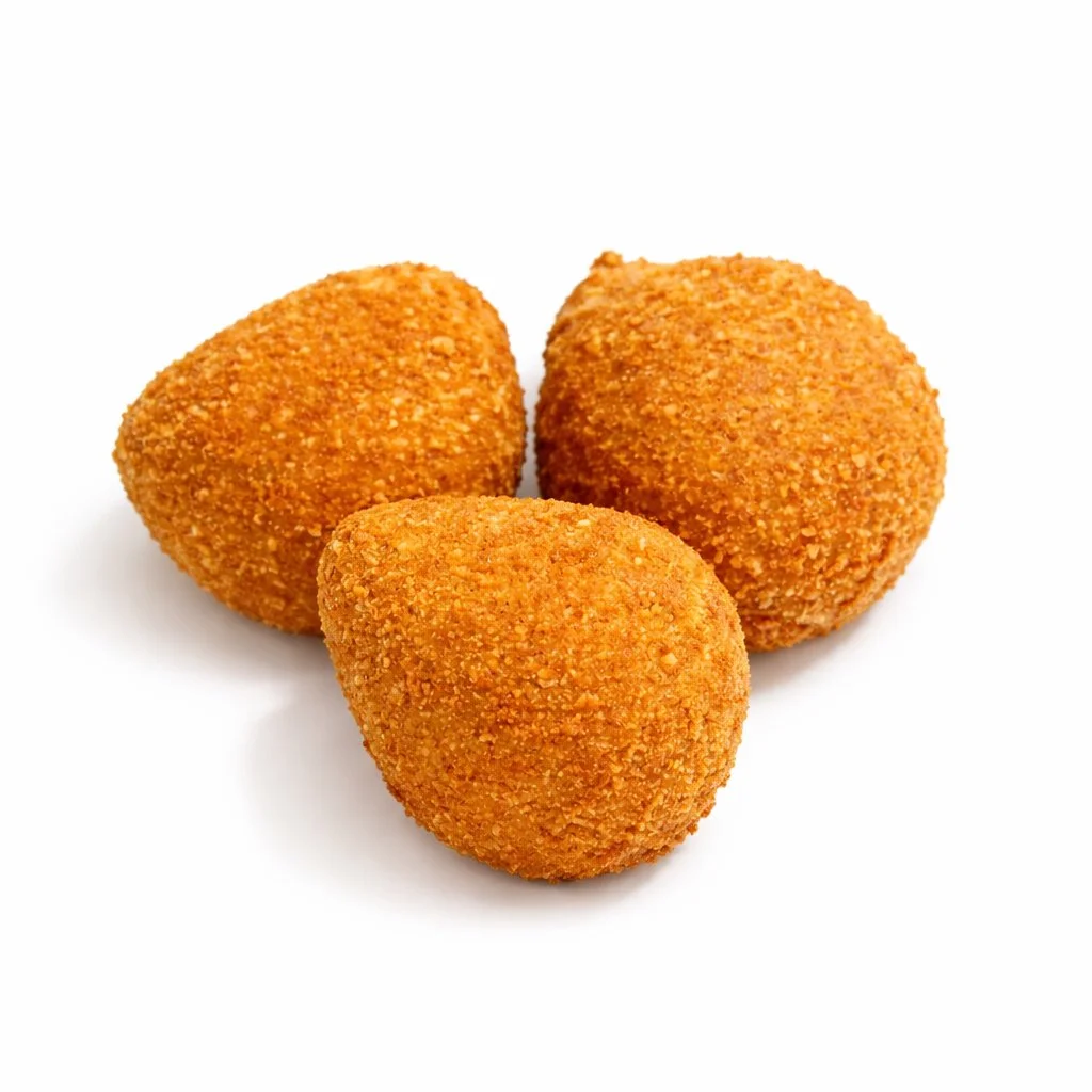 Three golden brown breaded fried Coxhina's on a white background.