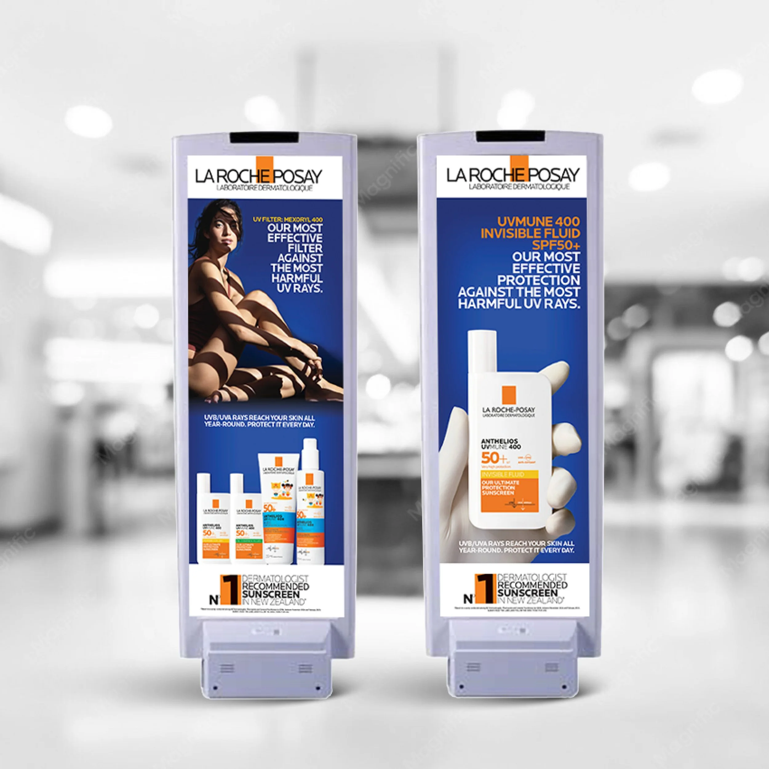 Two skincare product packages from La Roche-Posay, with one featuring a woman and the other showing a white bottle, both against a blurred light gray background.