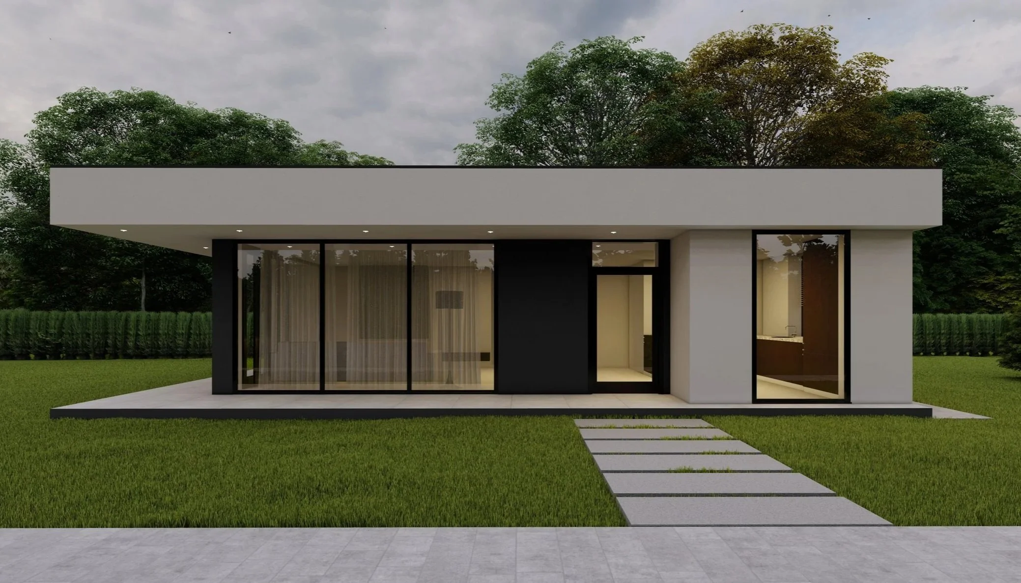 Modern single-story house with large glass windows, a white exterior, and a flat roof, situated in a grassy yard with trees in the background.