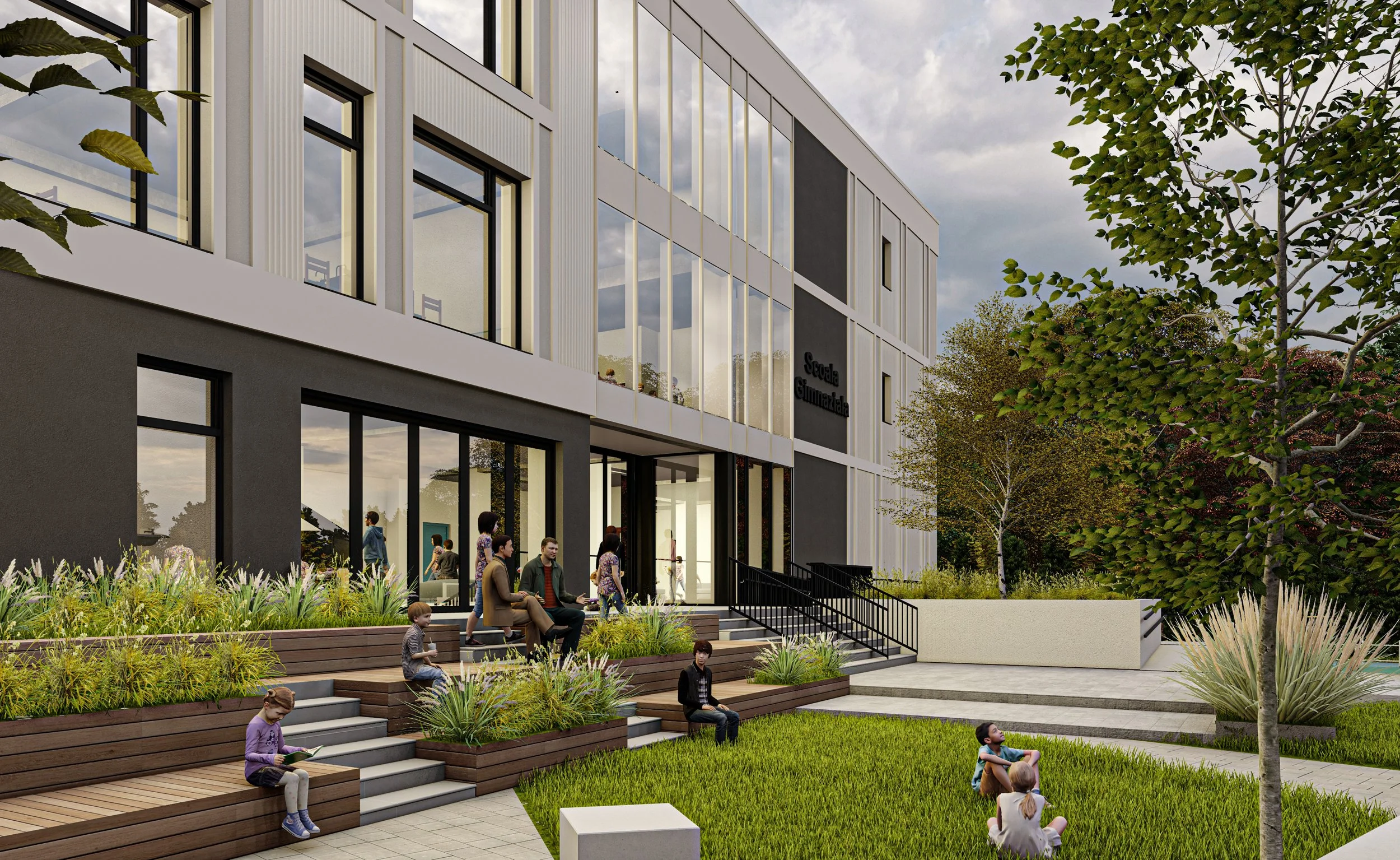 A modern school building with large windows and a landscaped outdoor area featuring steps, wooden benches, greenery, and children playing and sitting outside.
