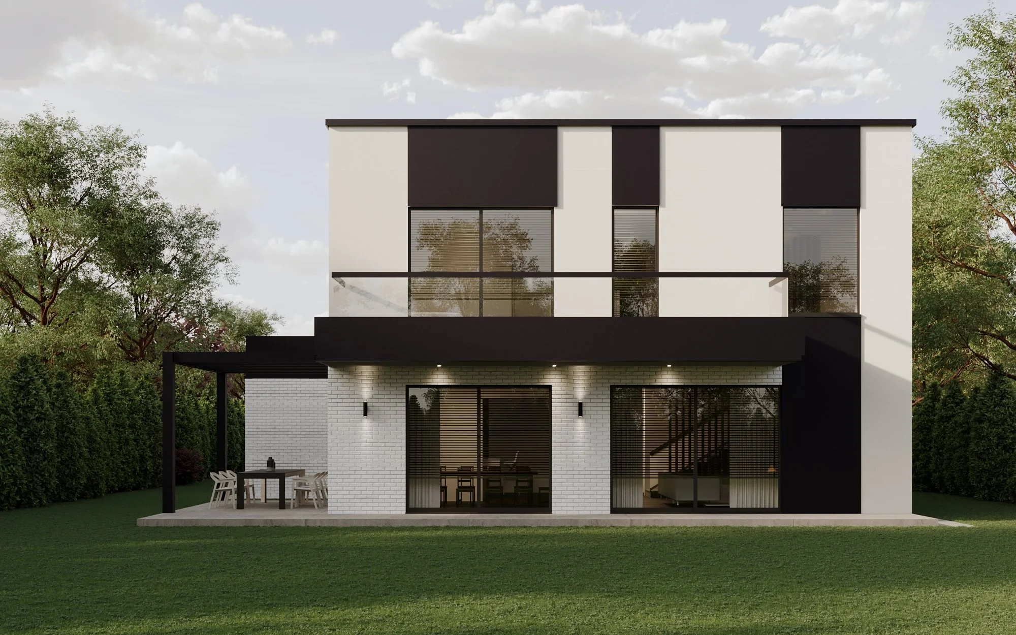 Modern two-story house with white brick and black accents, large glass windows, and a patio with outdoor dining, surrounded by green lawn and trees.