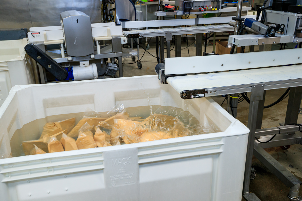 Soups in bags dunked in ice bath