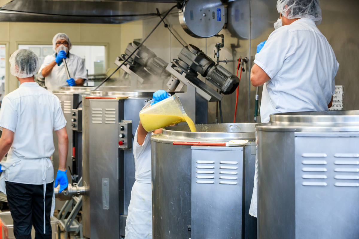 Pouring liquid into a vat