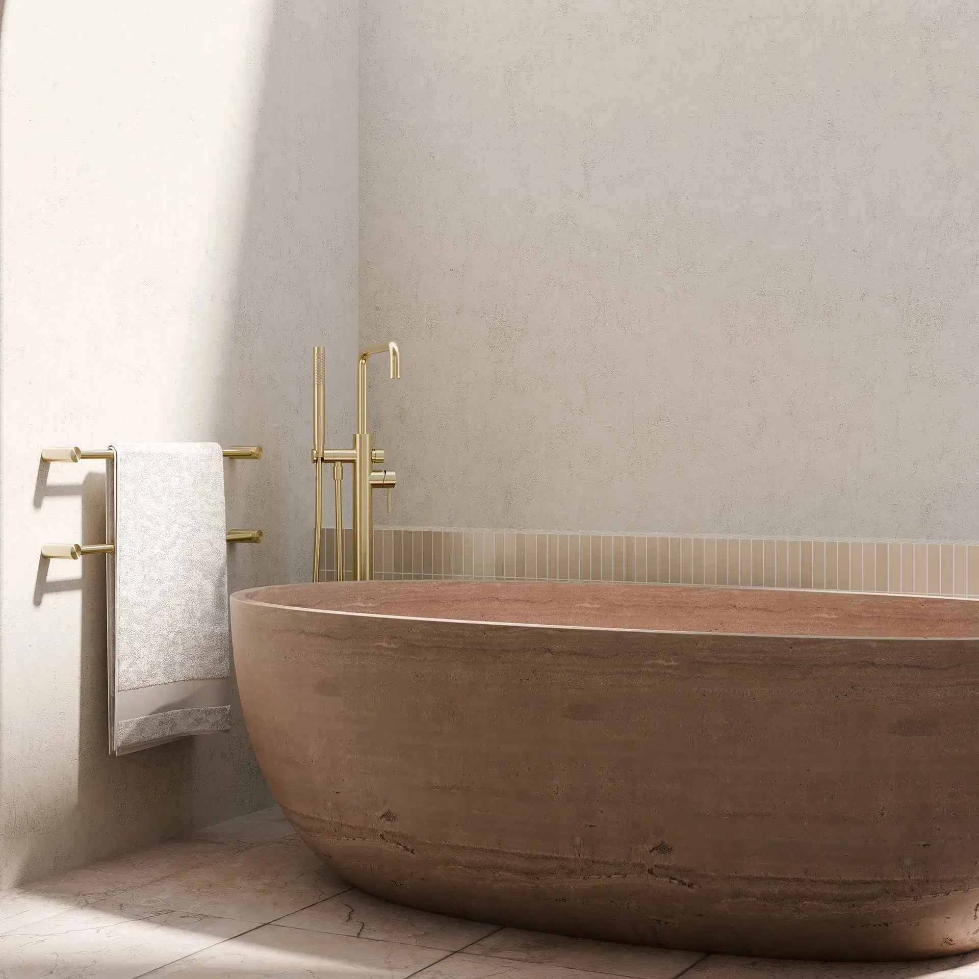 Small modern bathroom with marble walls and floor, a white wall-mounted sink, a round mirror, a wall-mounted toilet, and a towel ring.
