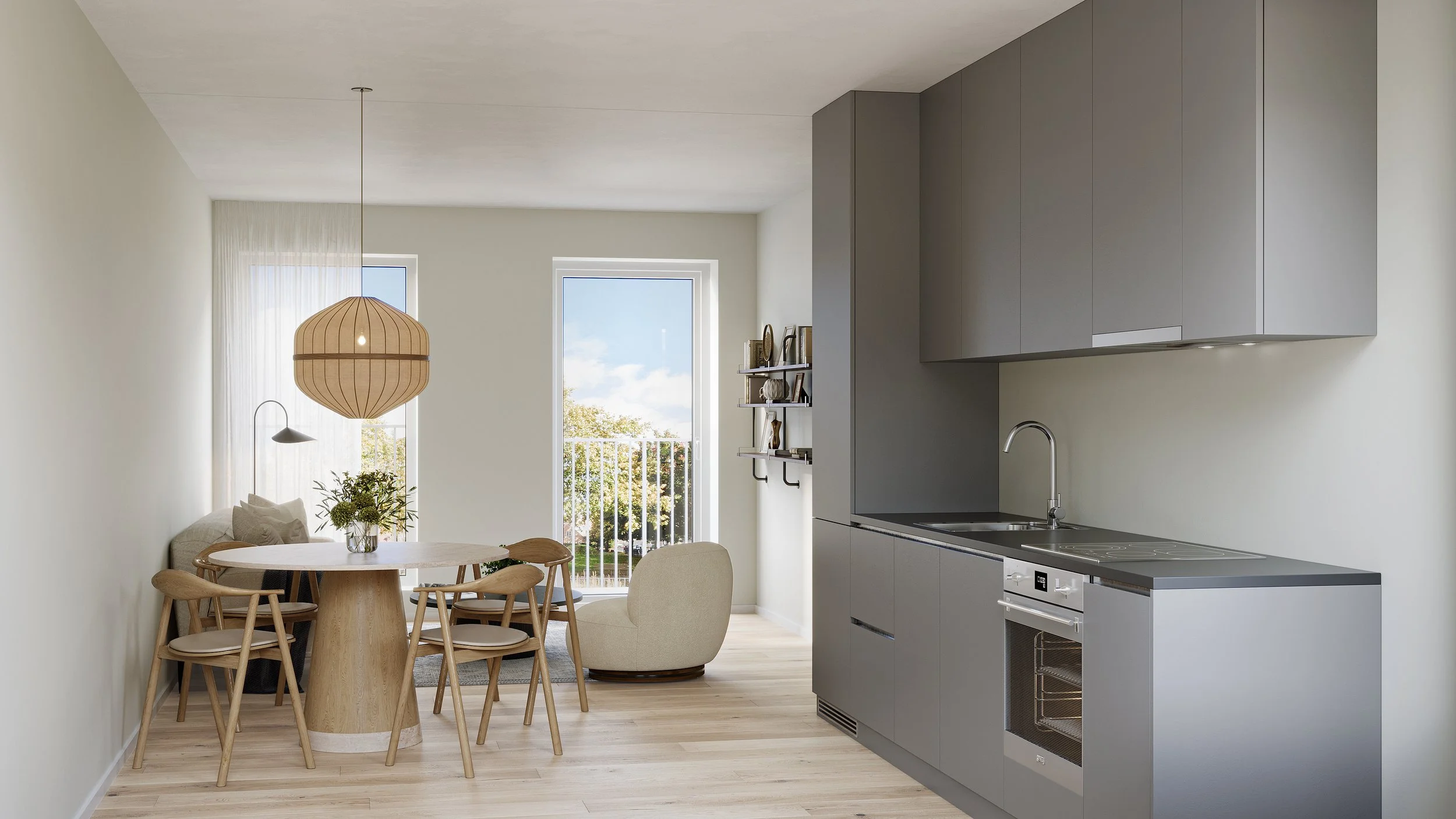 Moderne lejlighedskøkken med spisebord og opholdsområde med vinduer, lyse vægge og minimalistisk indretning.