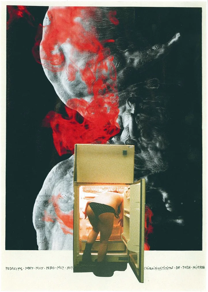 Person in underwear looking into an open refrigerator with a large artistic mural of two faces on the wall behind.