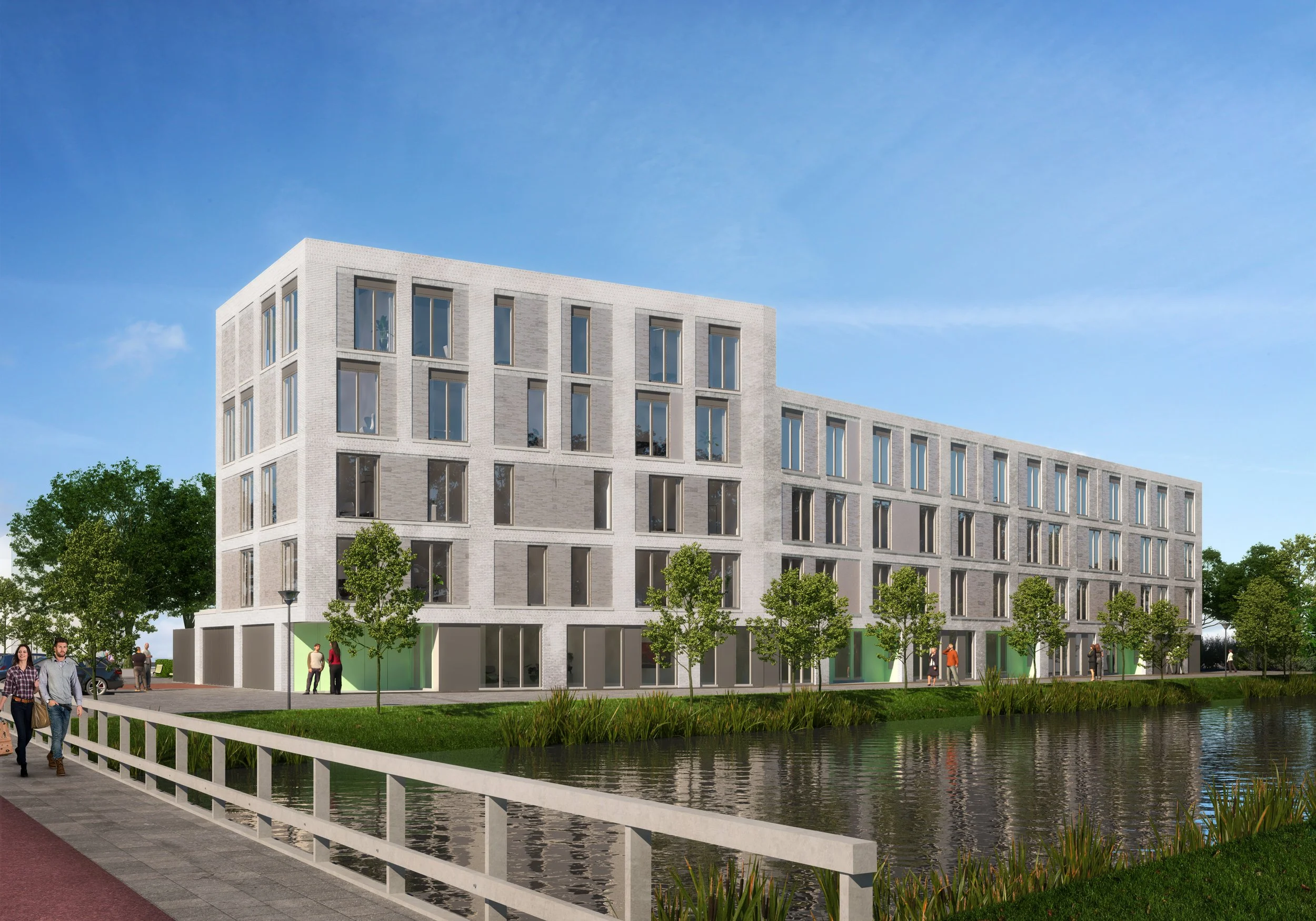Moderne witte appartementengebouw naast een waterkant met wandelpad en groene bomen.