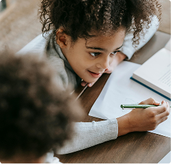 A young girl with a pencil