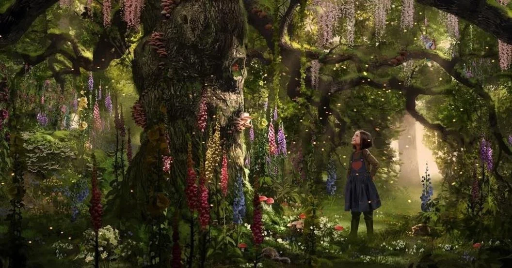 A girl standing in a lush, magical forest with colorful hanging flowers, glowing lights, and sunlight filtering through the trees.