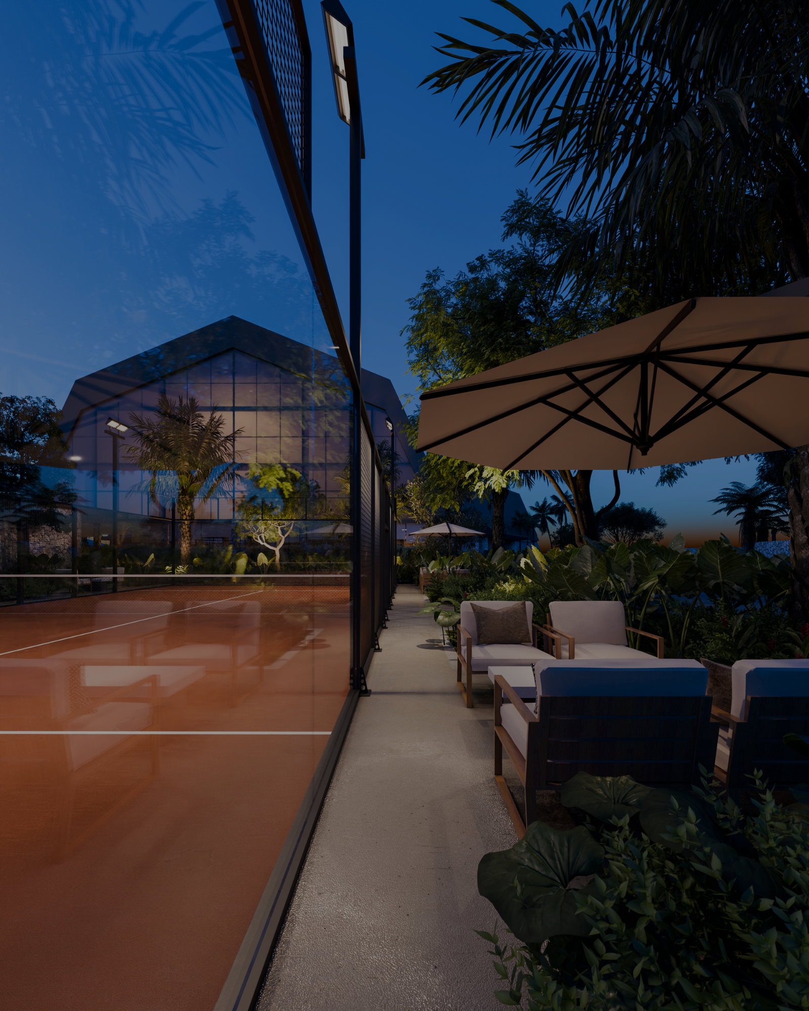 A person playing tennis on a red clay court, viewed from above, with shadows casting across the court.