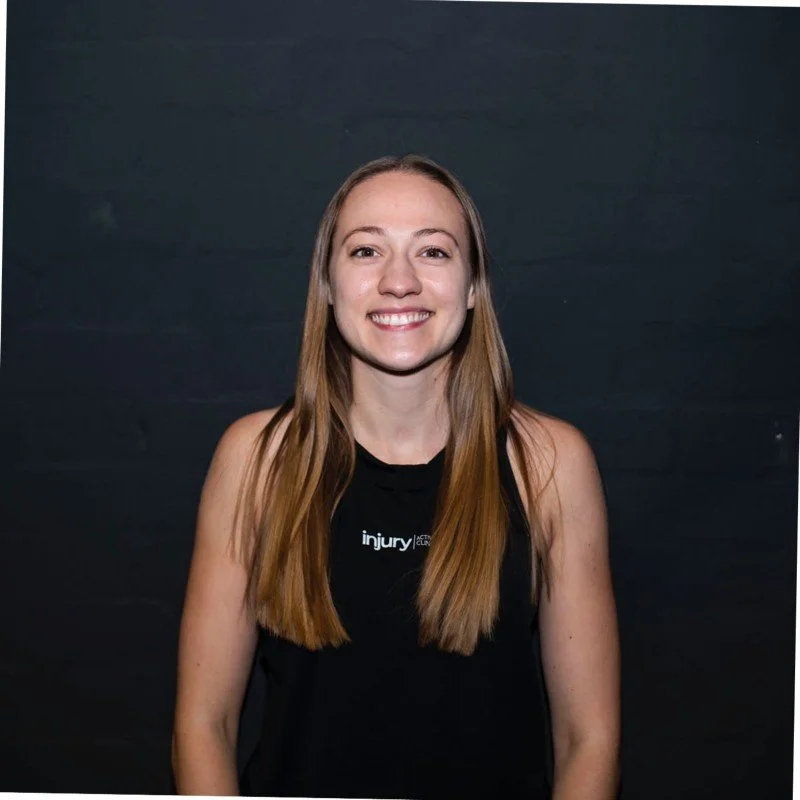 Emma, sports rehabilitation therapist at REVIVE Injury Clinic in Bury St Edmunds