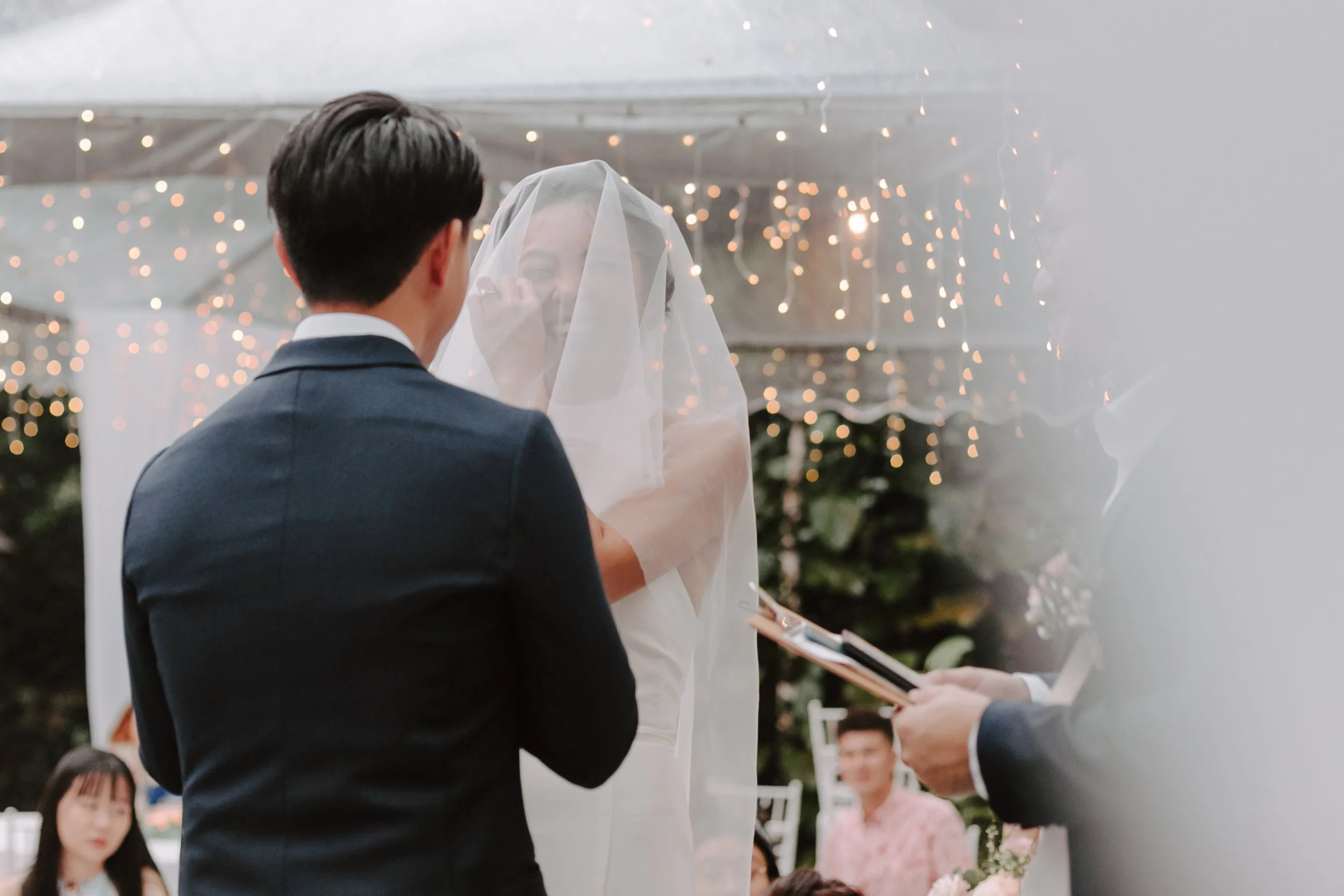 he day began bright and calm with a meaningful tea ceremony, while gentle rain arrived in the evening—leading the celebration indoors for heartfelt vows and a joyful wedding dinner at Ratu Rening Residency.