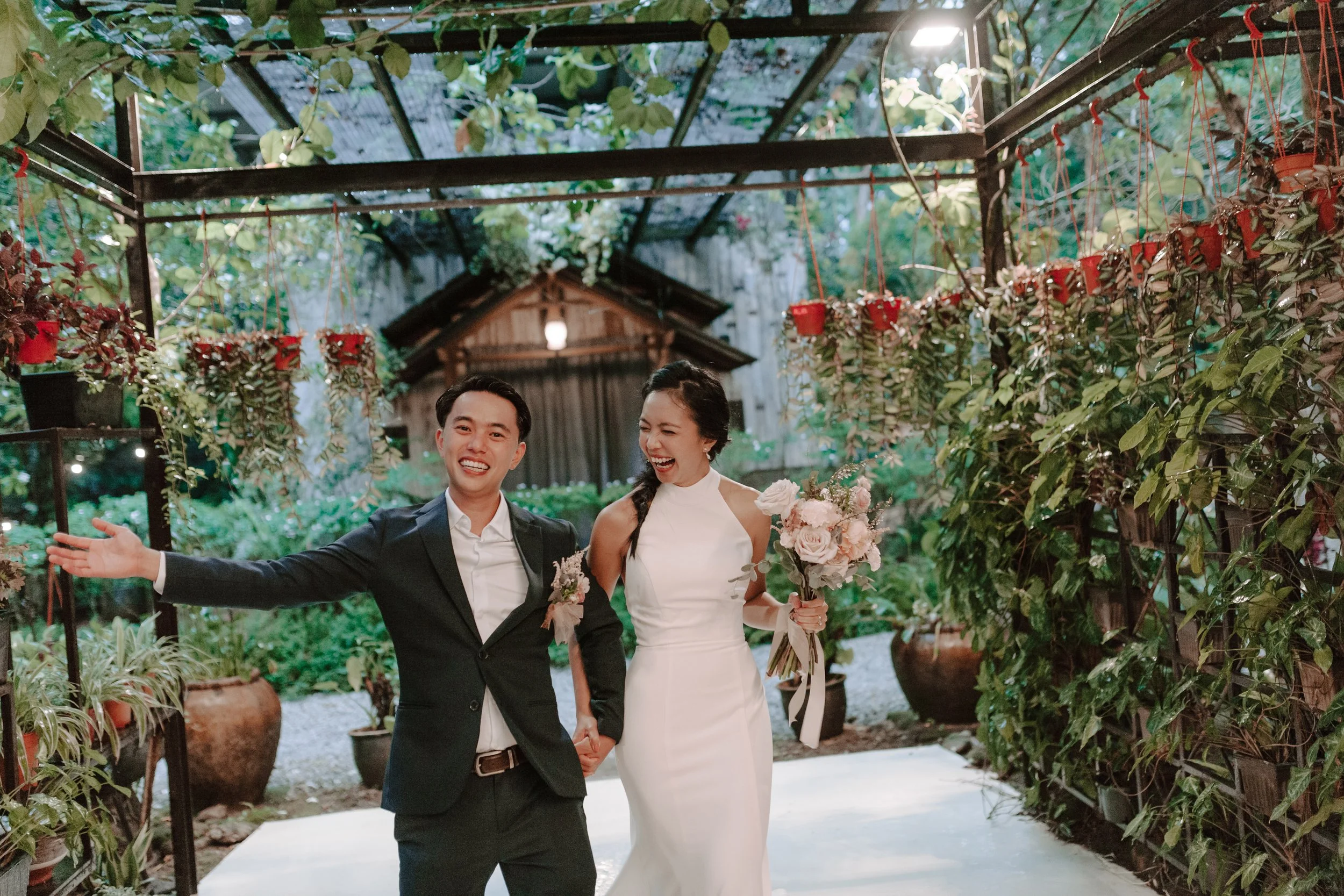 The day began bright and calm with a meaningful tea ceremony, while gentle rain arrived in the evening—leading the celebration indoors for heartfelt vows and a joyful wedding dinner at Ratu Rening Residency.