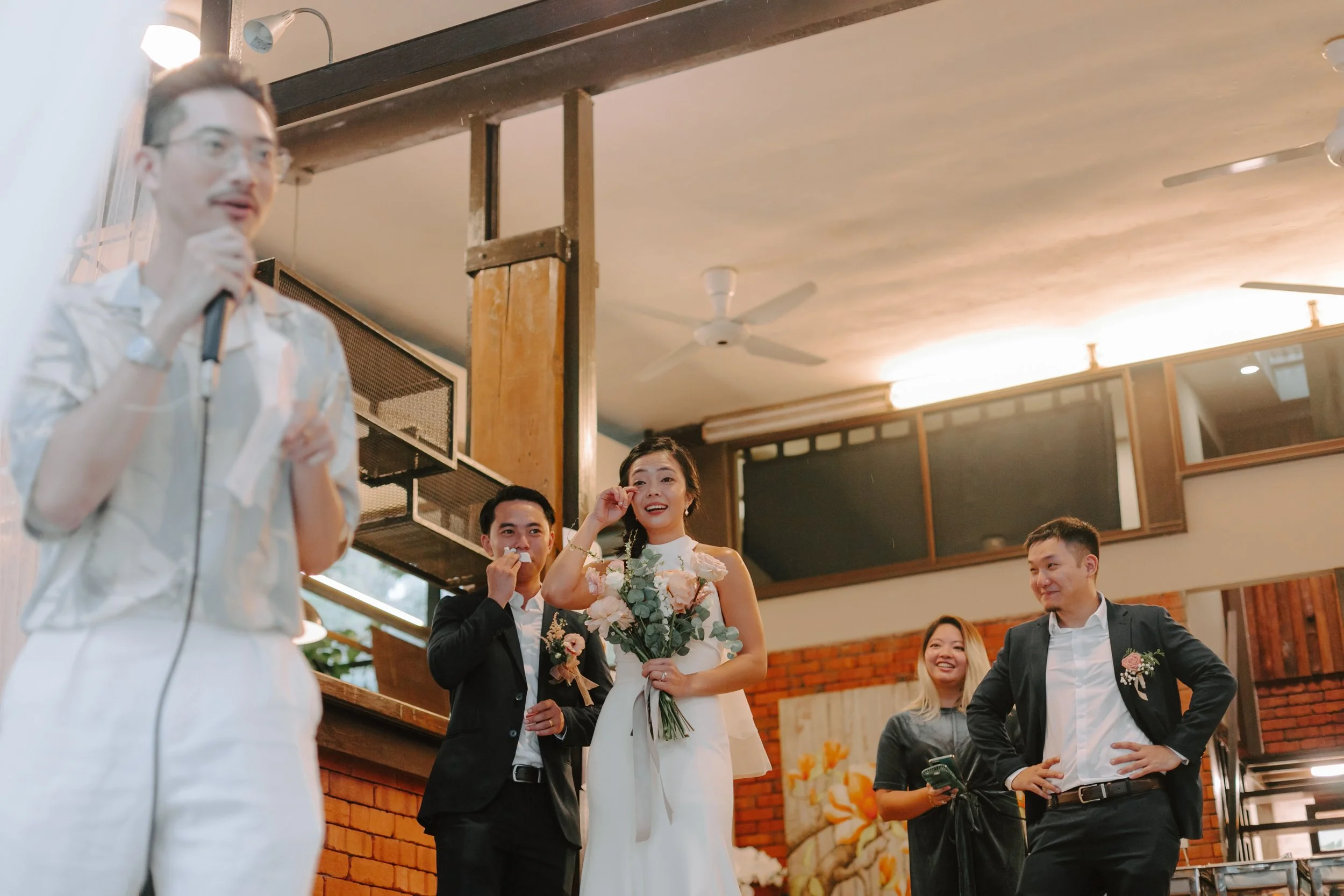 The day began bright and calm with a meaningful tea ceremony, while gentle rain arrived in the evening—leading the celebration indoors for heartfelt vows and a joyful wedding dinner at Ratu Rening Residency.