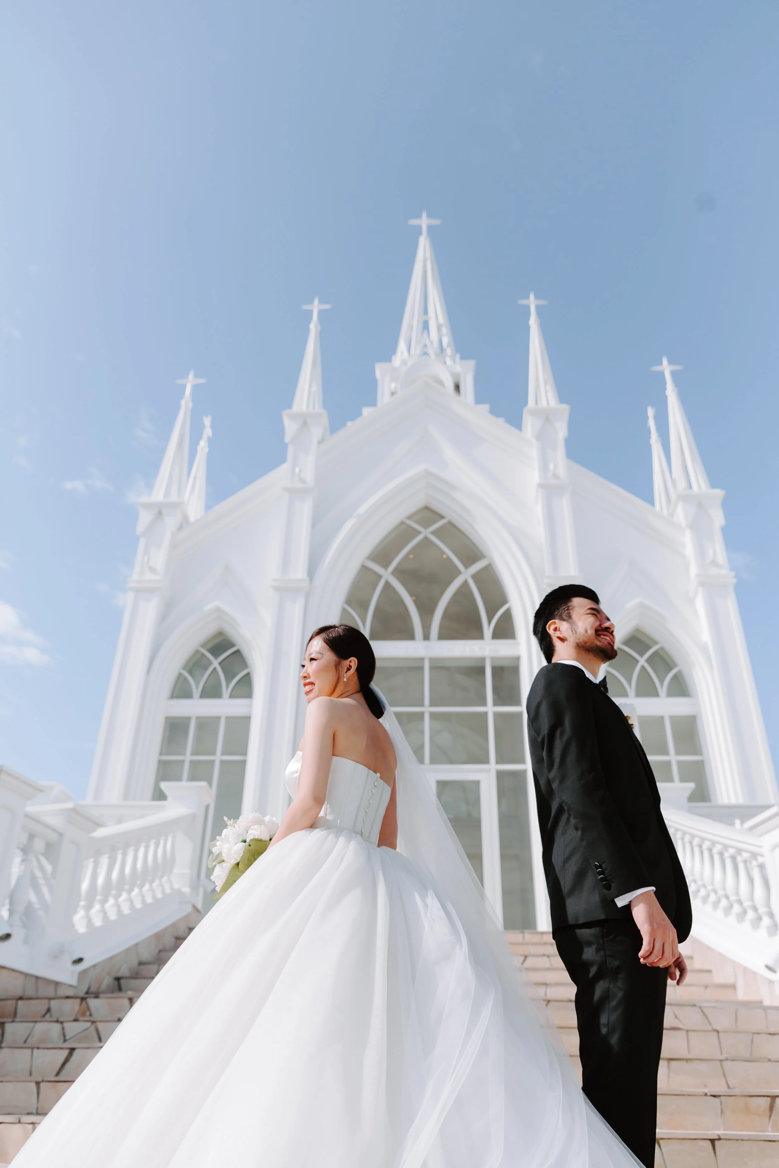 Josh & Chrisanne
A beautiful Okinawa wedding at Lazor Garden Alivila Chapel, where pristine white walls meet clear blue ocean views.