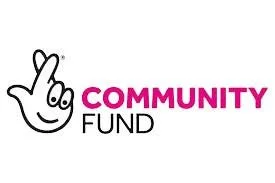 Logo of a community fund featuring a smiling hand gesture and the words "Community Fund" in pink and black text.