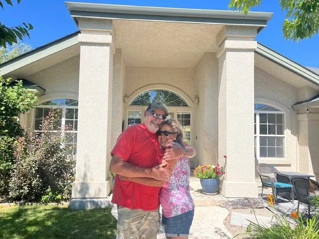 Happy senior couple settling into their new home in Carson City Nevada after a smooth relocation with Lisa Williams The A Team