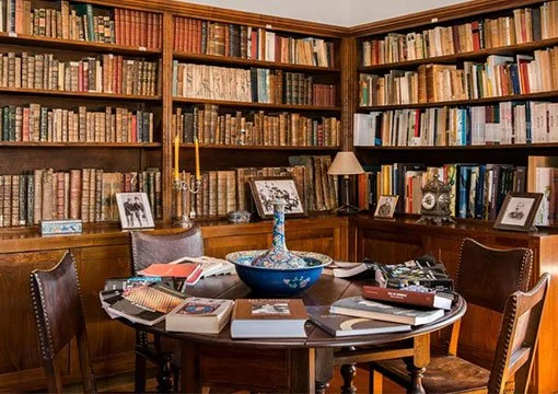 Library of Eça de Queirós at Casa de Tormes, featuring bookshelves and preserved interior details.