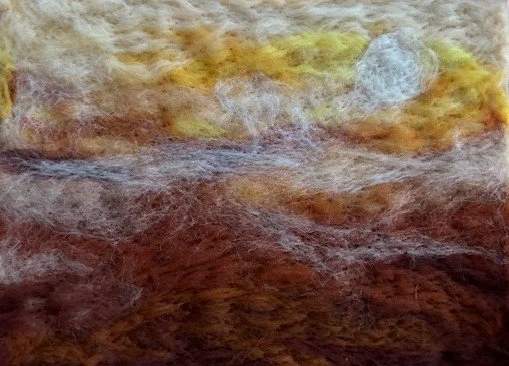 Abstract textured artwork with warm colors like yellow, orange, and red, and features a large white circular shape in the upper right area.