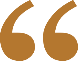 A large, stylized quotation mark in brown on a black background.