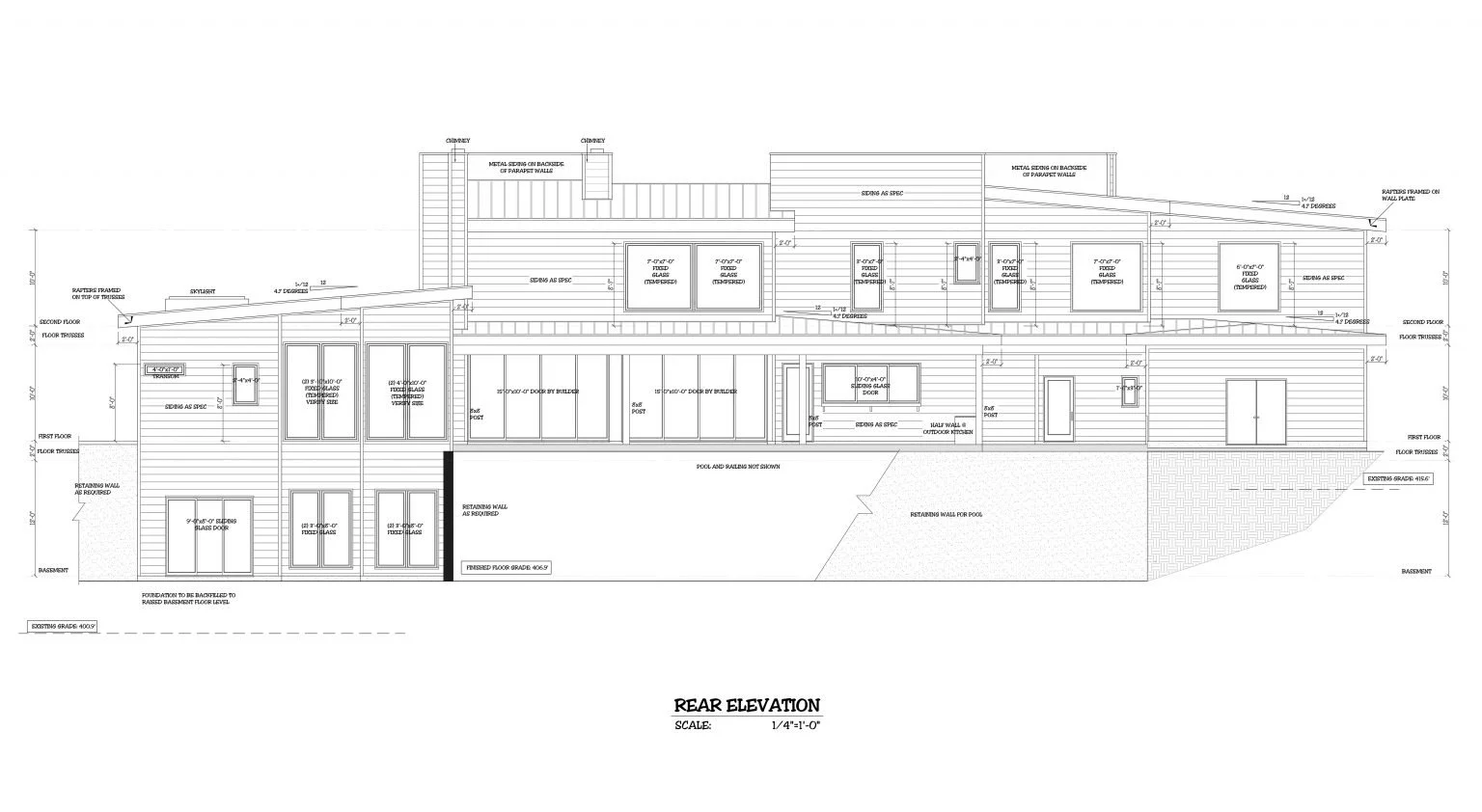 Architectural blueprint of a multi-story building, showing rear elevation details with measurements, windows, doors, and construction notes.