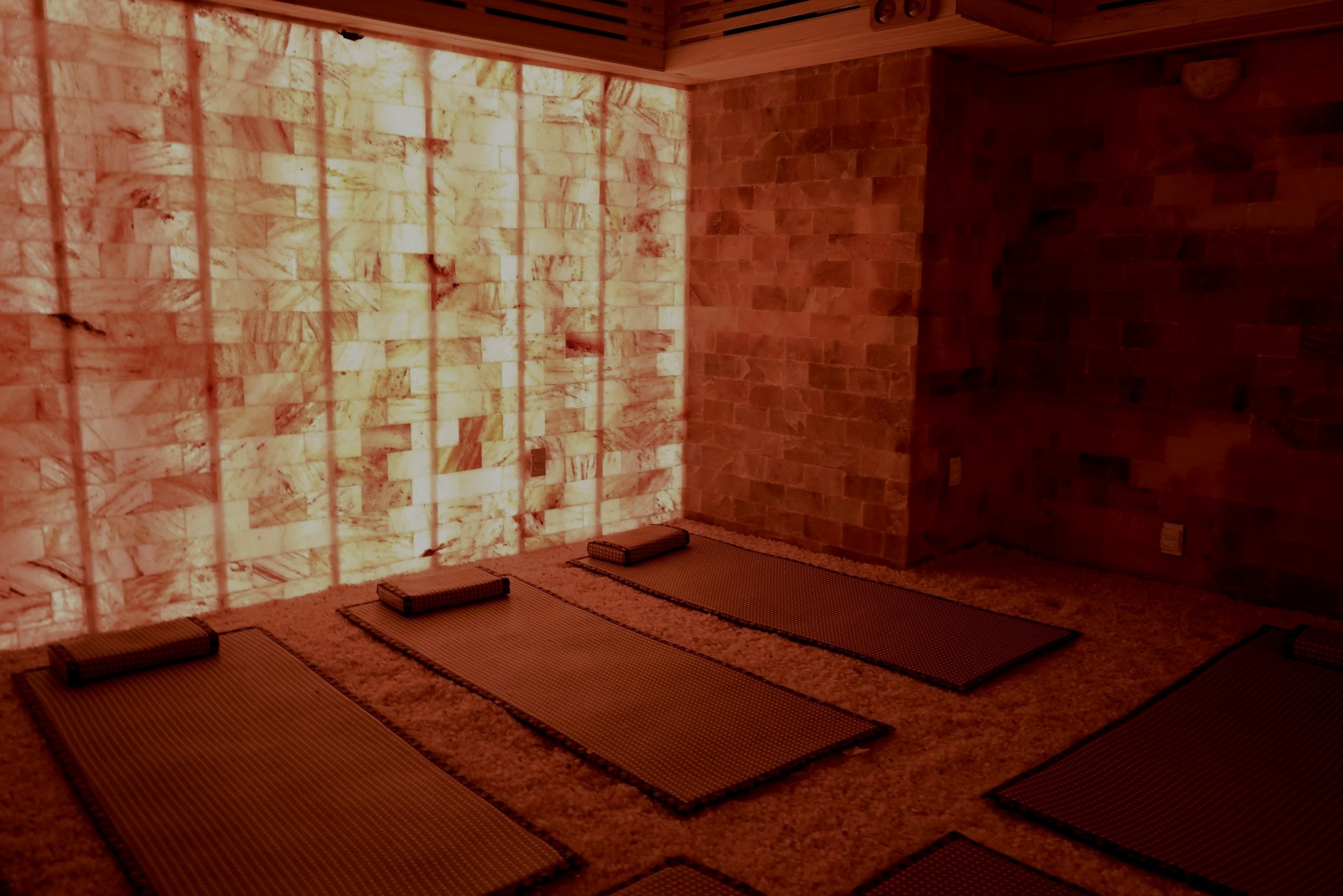 Himalayan salt therapy room at Karma Wellness in Mission Hills, San Diego designed to support relaxation, respiratory health, recovery, stress reduction, and wellness through salt therapy and calming heat exposure.