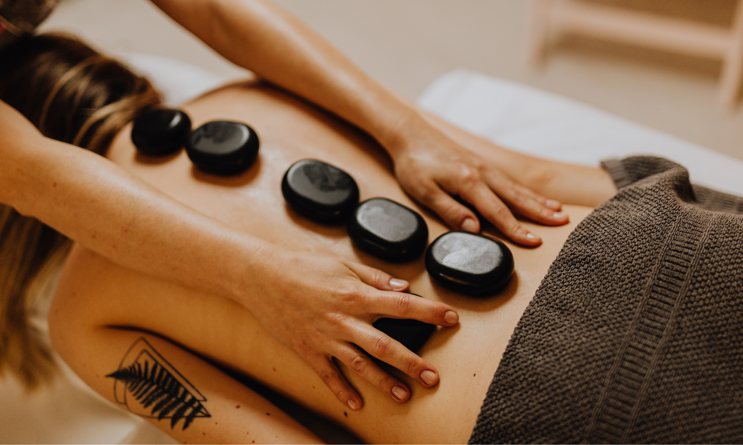 therapeutic massage, deep tissue massage, muscle tension relief, chronic pain relief massage, nervous system regulation, hot stone massage