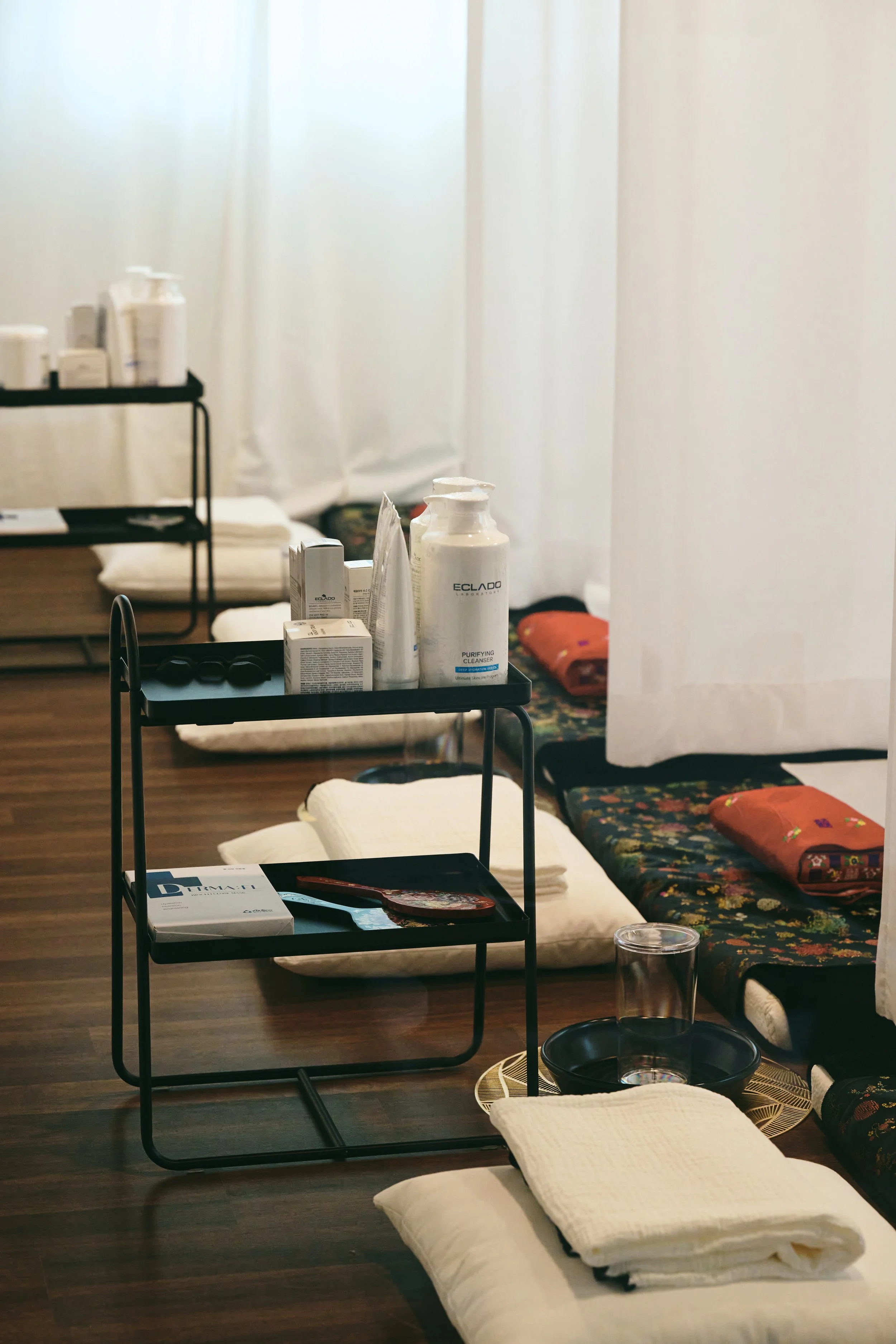 Skincare tools and Korean beauty products prepared for facial treatments at Laurel Studio in Hongdae.