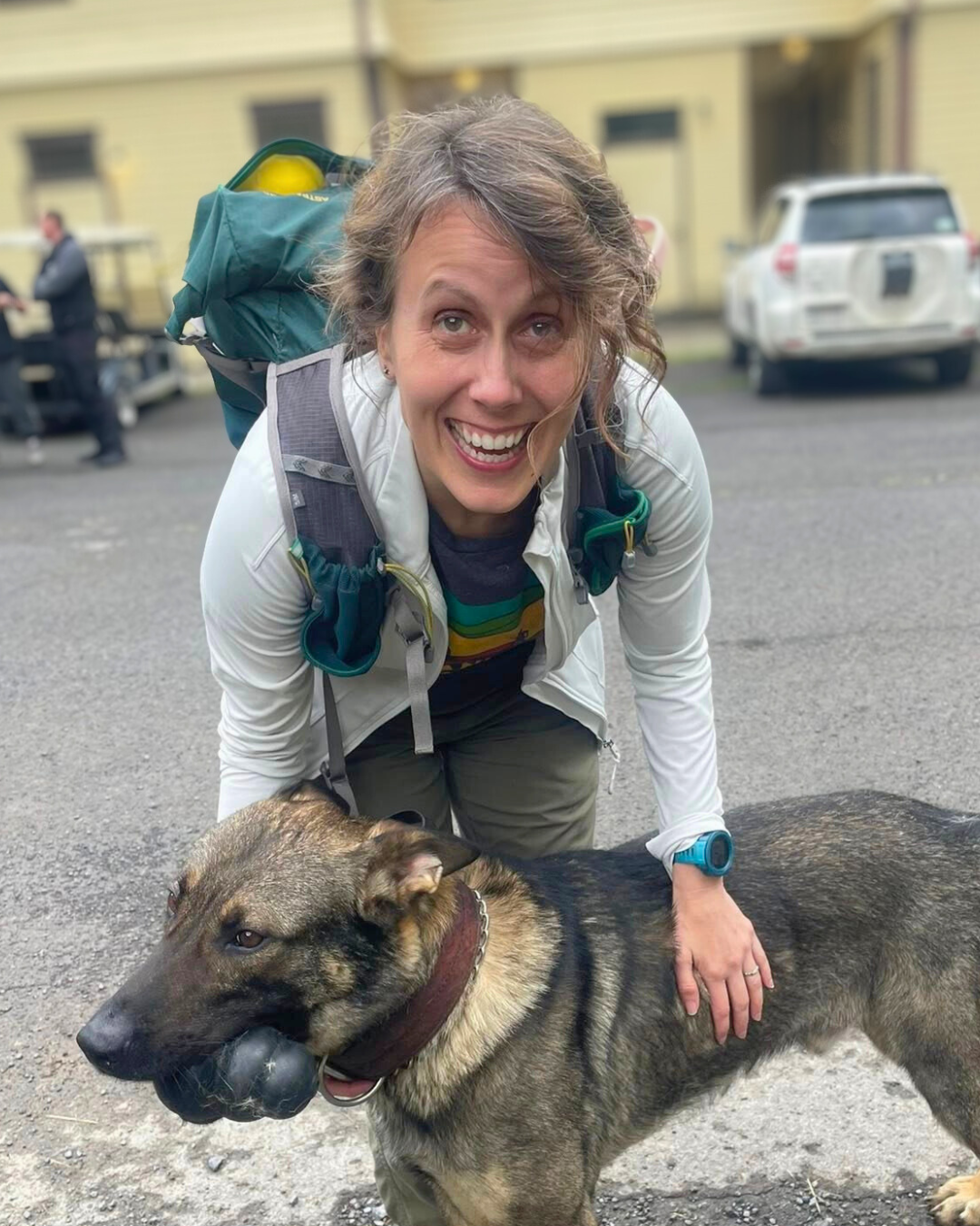 Kate smiling with her dog