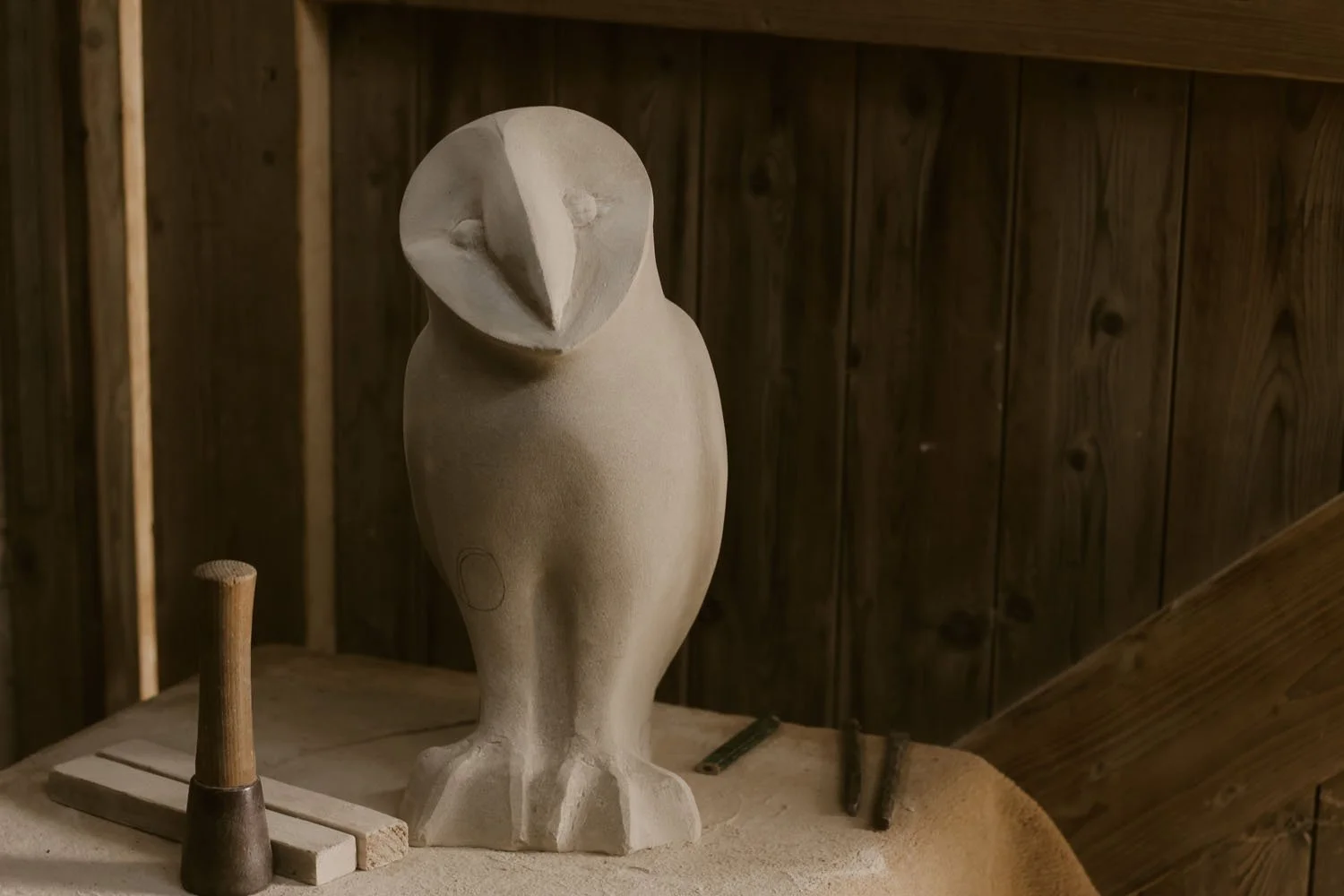 Stone sculpture of an Owl taking shape