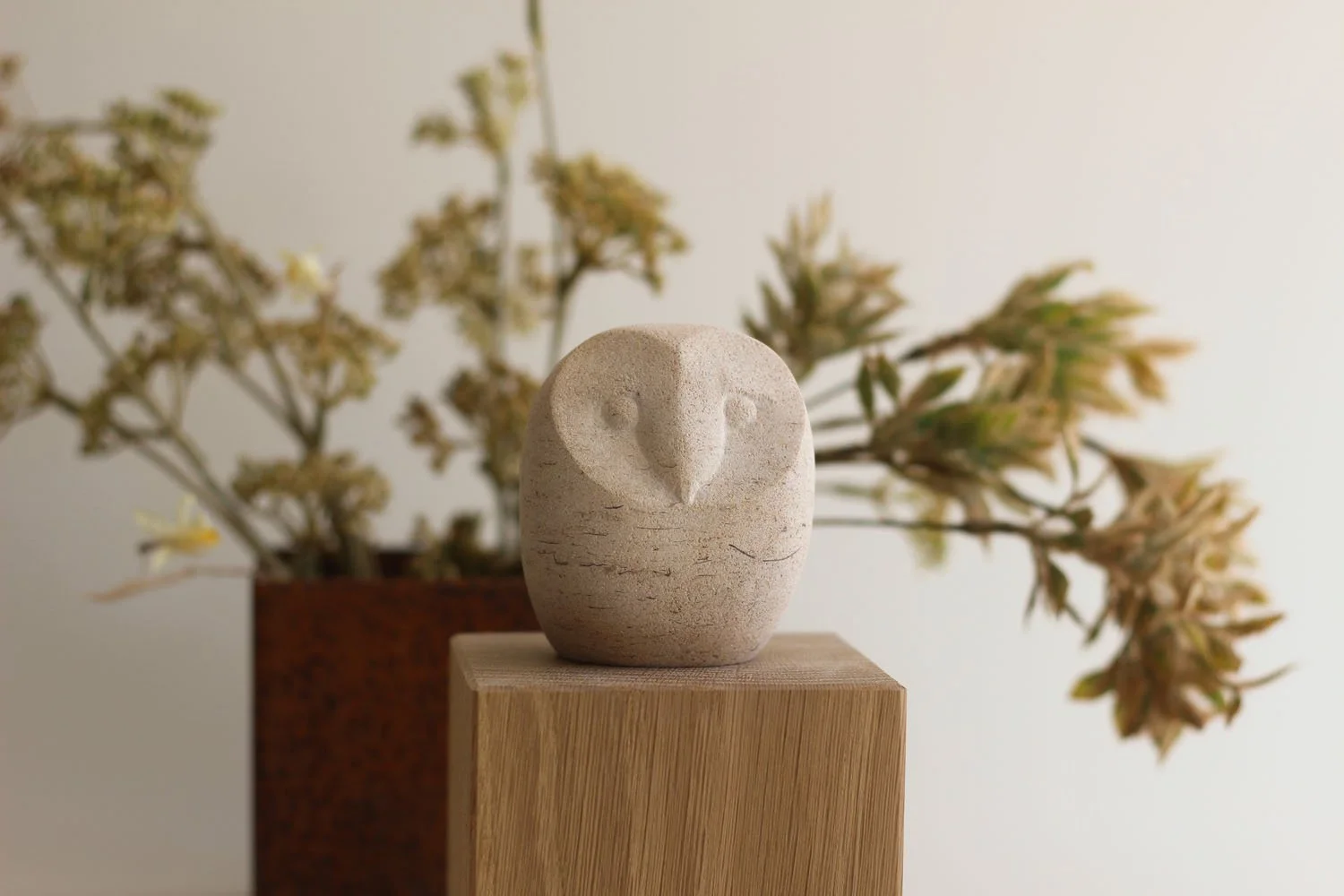 Little Hushwing owl stone sculpture.jpg
