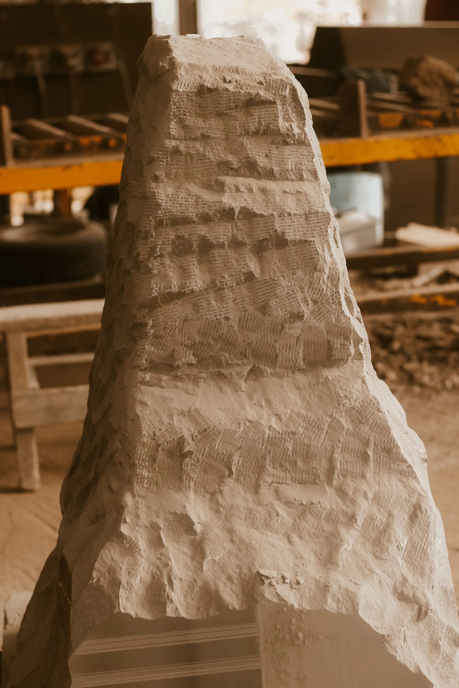 Initial shaping of the stone block for the Pikorua sculpture