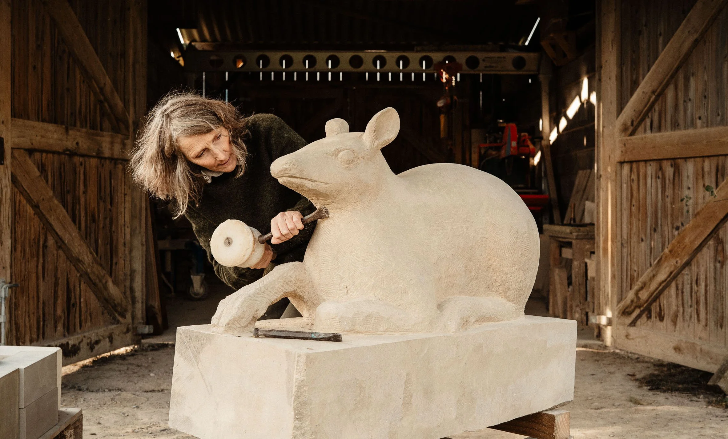 Carving a stone sculpture in my workshop