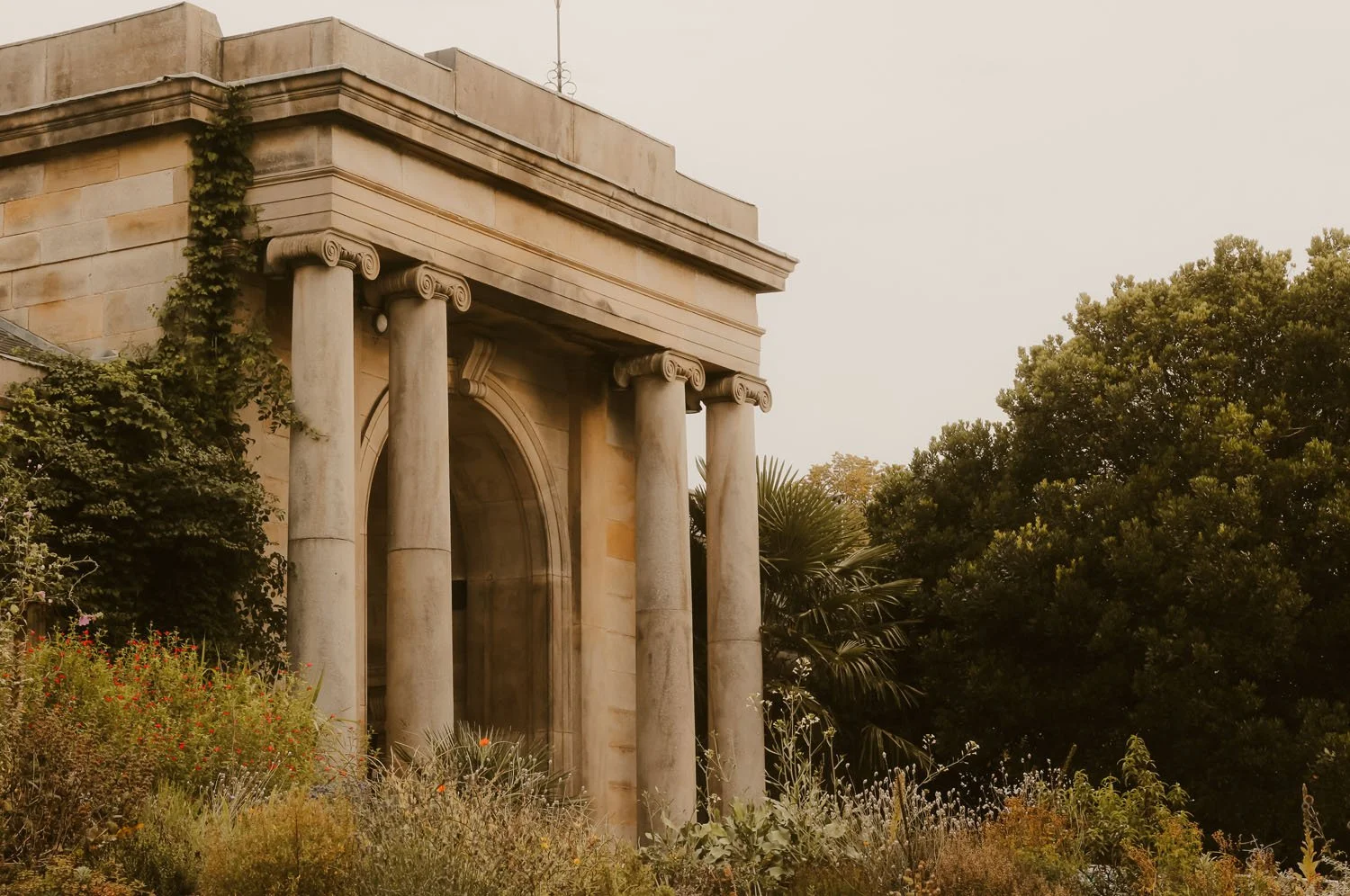 the stone columns of the Gate House Entrance at Sheffield Botanical Gardens