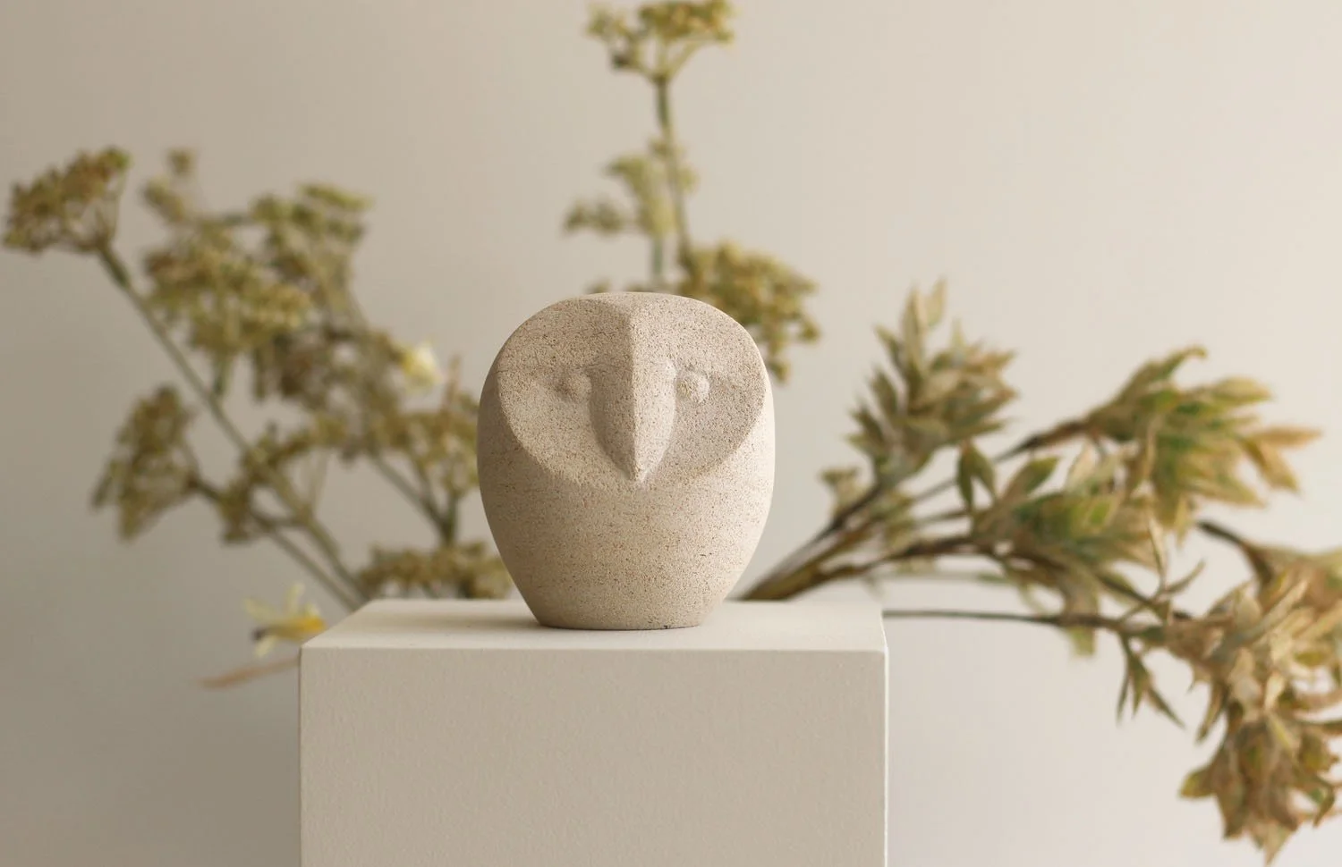 Little Hushwing Barn Owl sculpture in natural stone.jpg