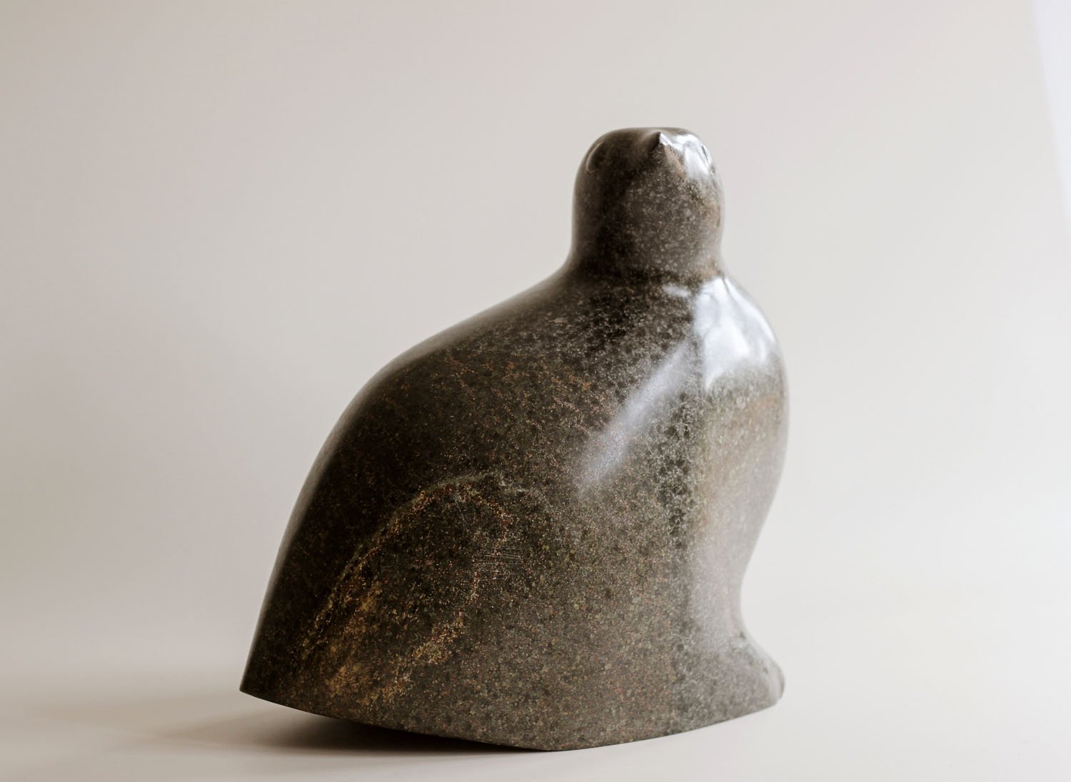 Bird Looking Out sculpture carved in stone.jpg