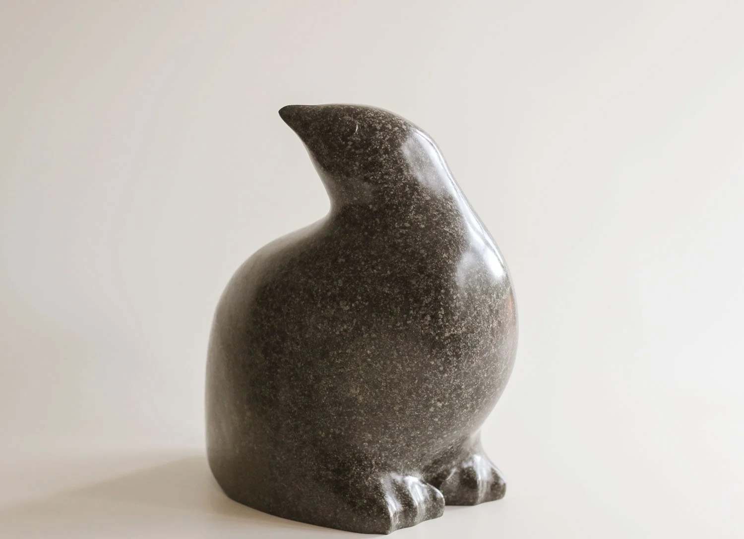 Bird Looking Out sculpture in stone.jpg