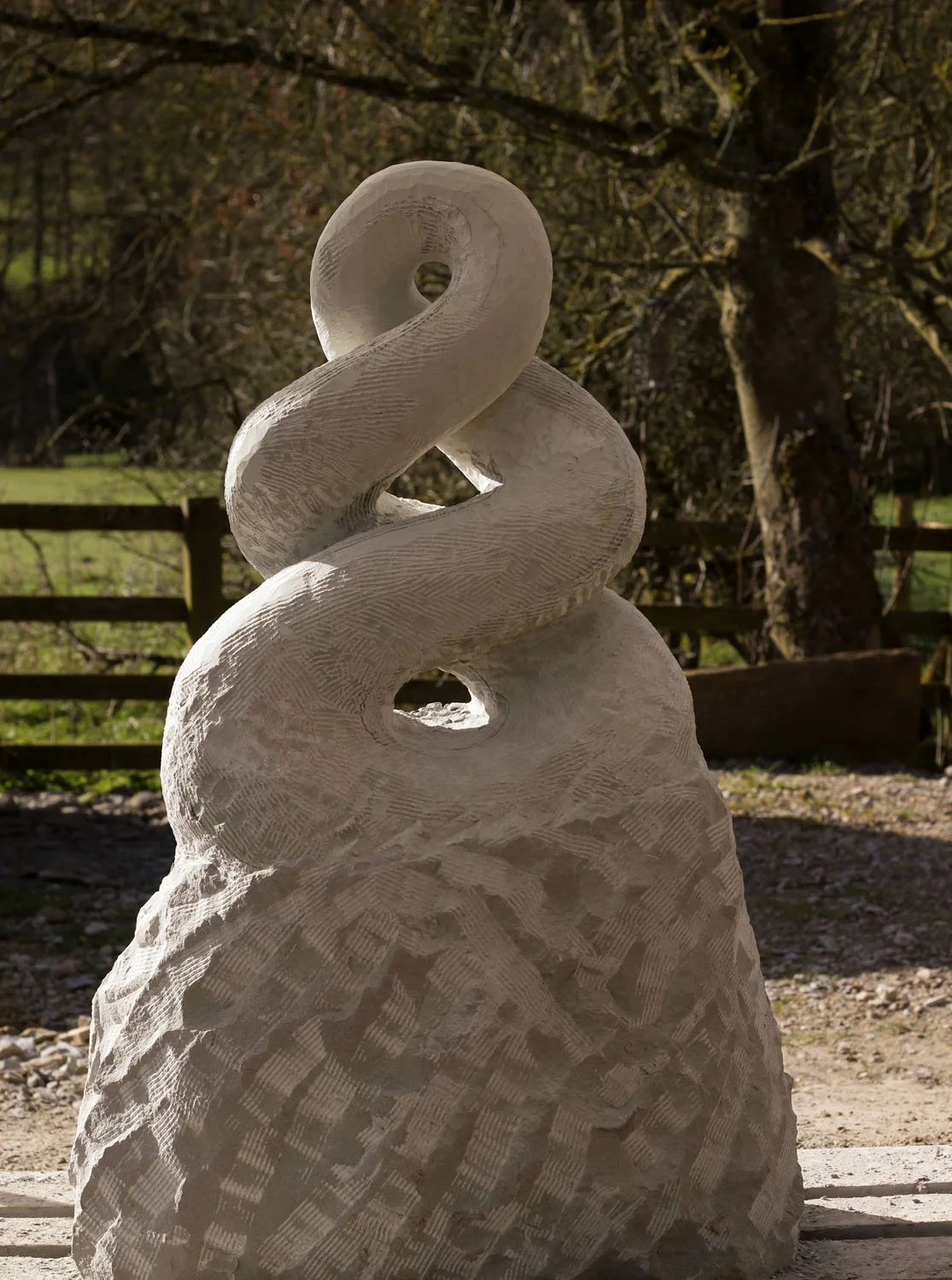 Pikorua sculpture showing the piece from raw stone through to finished commission for the New Zealand Garden at Valley Gardens, Harrogate