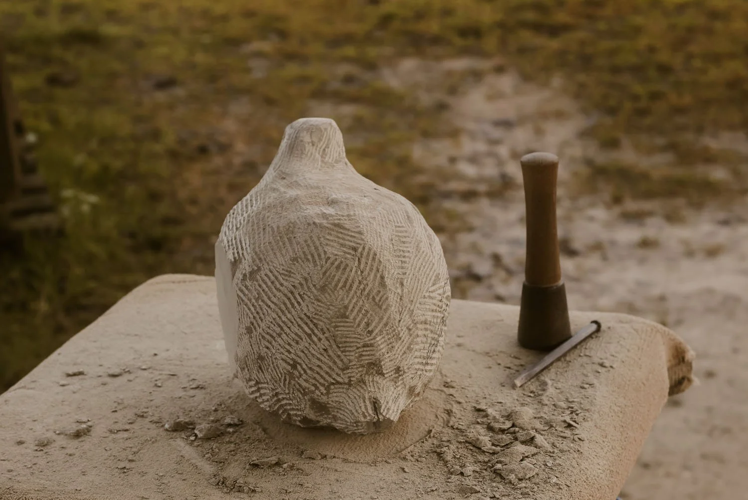 Grey Partridge carved in stone