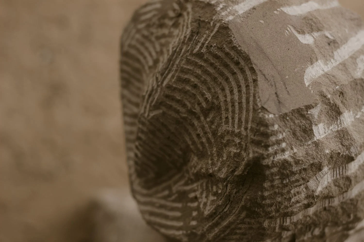 there is elation as the owl shape begins to emerge in the stone