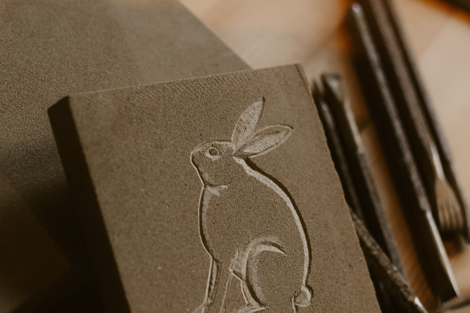 Stone tile carved with a medieval styled Hare
