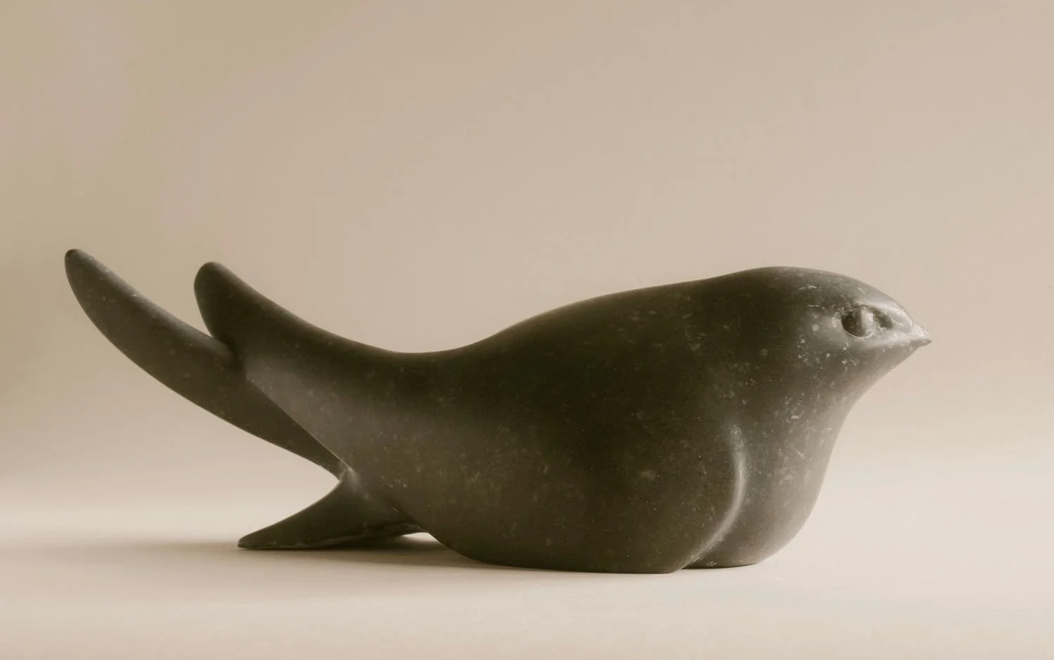 Swift sculpture carved in stone for the Masham Swifts Sculpture commission