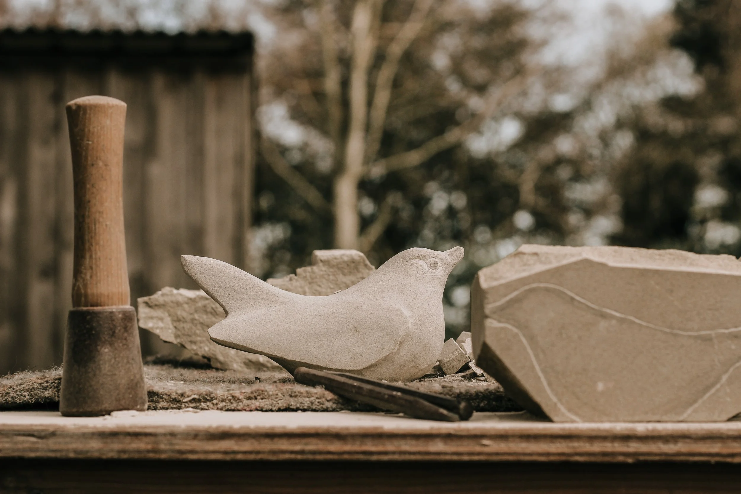 Carving progress of stone Bird sculpture