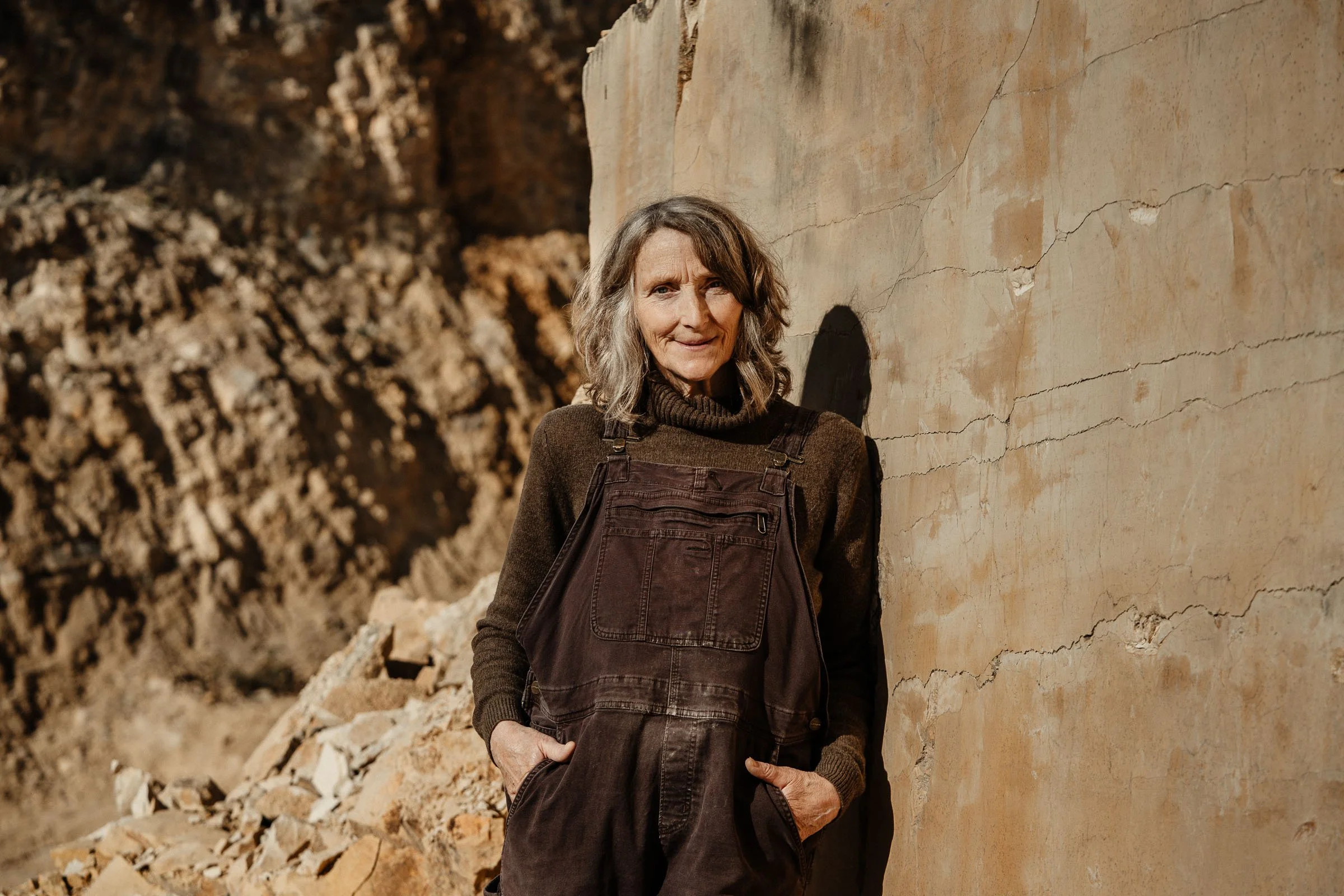 sculptor visiting the quarry to select stone for carving