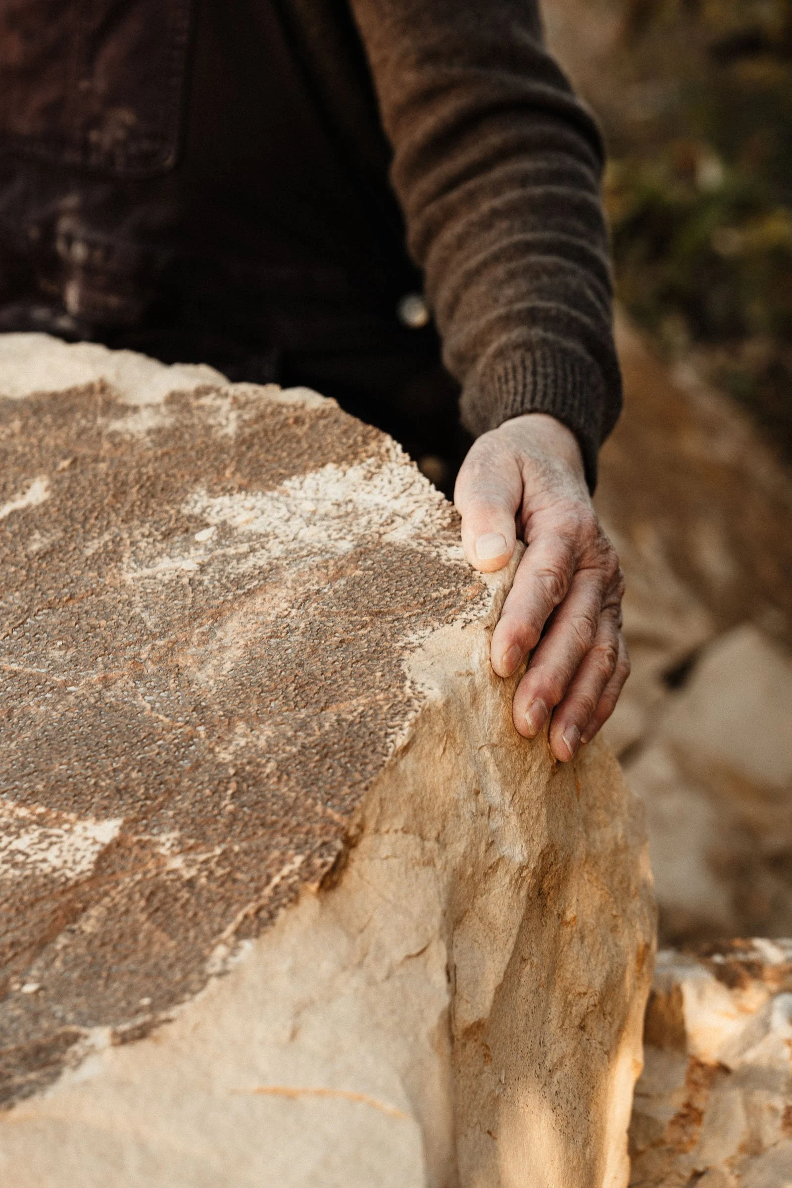At the quarry selecting a block of stone for a sculpture commission