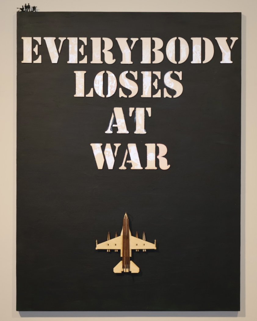 Everybody Loses at War, 2025,
Acrylic Paint, Laser Cut Wood, Toy Soldiers, Reflective Paint, on Wood Panel.
48”x 36”